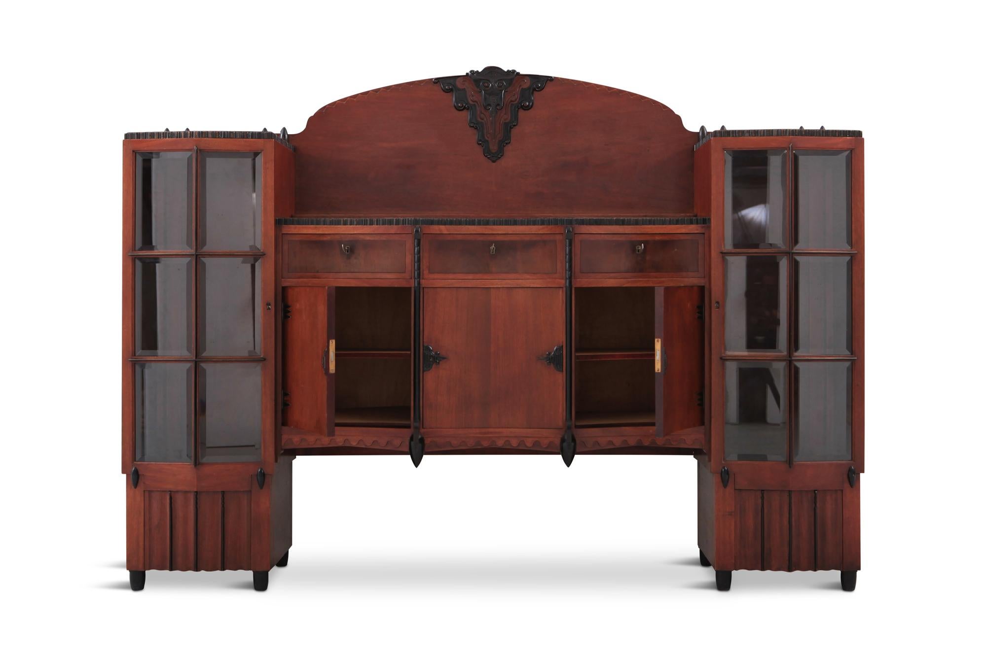 Atelier Speelman designed this wonderful Amsterdam School sideboard in a style reminiscent of works by Jaap Gidding.

Manufactured in Rotterdam, Netherlands in 1925.
   