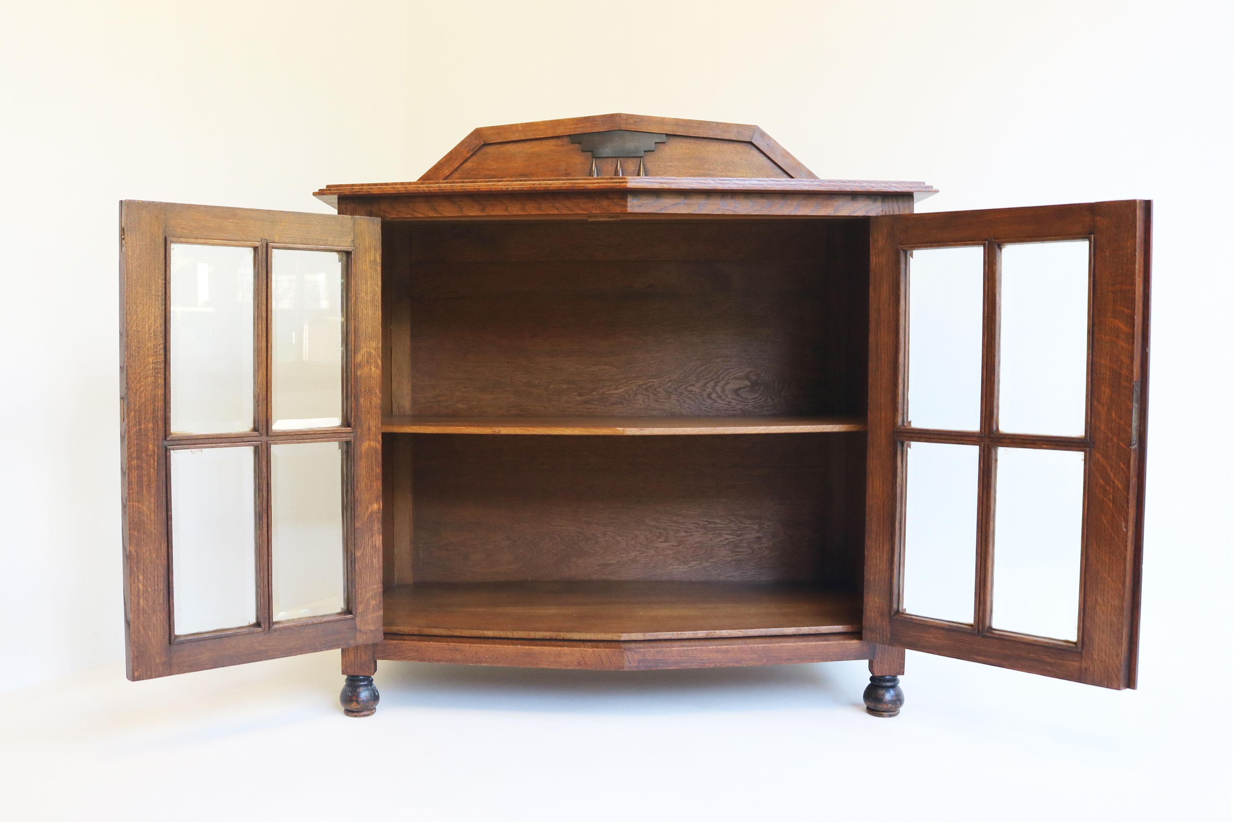 Glass Amsterdams school tea cabinet / display cabinet European oak beveled glass 1920 For Sale