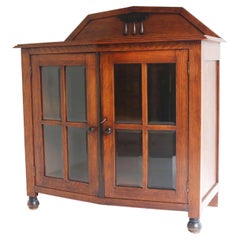 Used Amsterdams school tea cabinet / display cabinet European oak beveled glass 1920