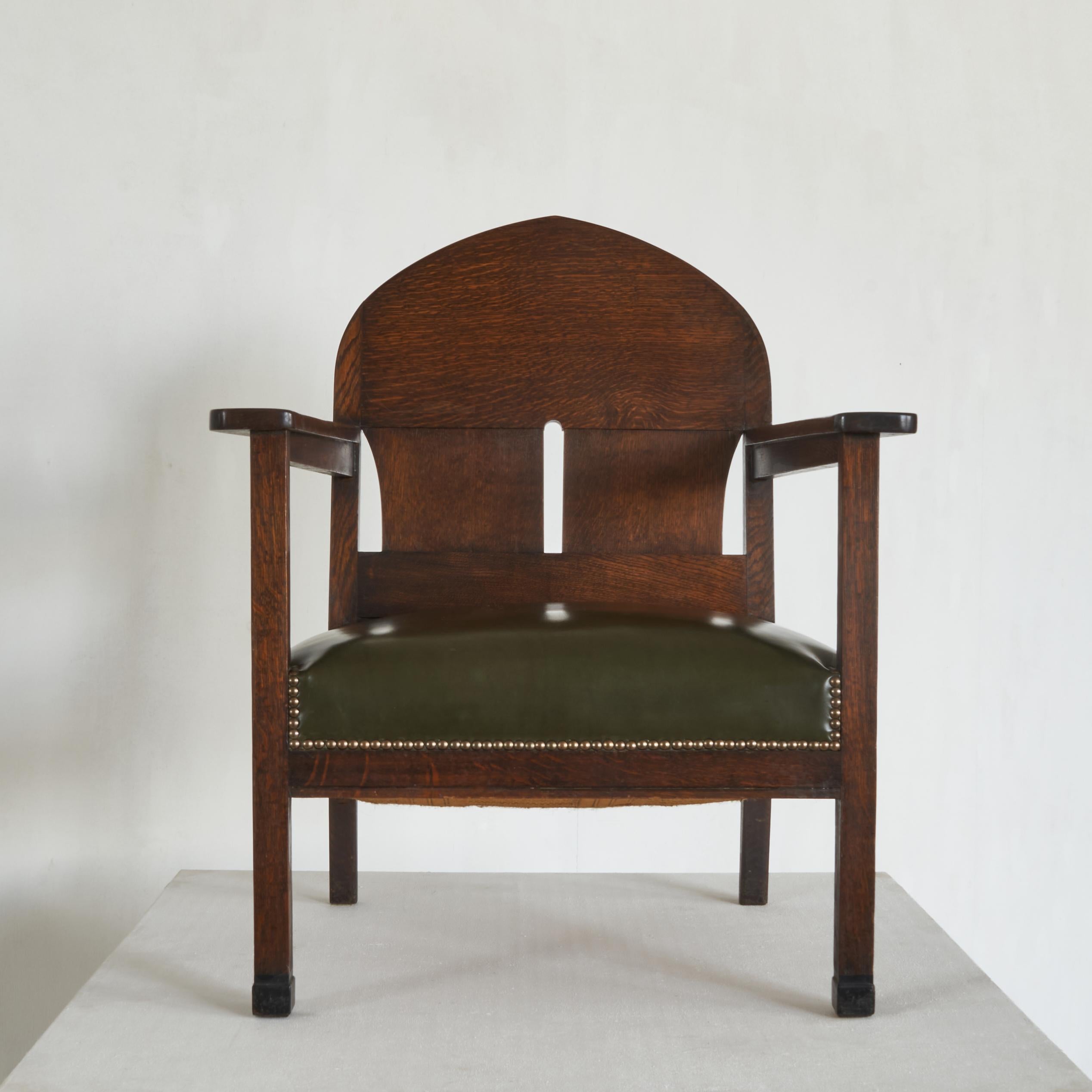 This easy chair made by designer and architect Harry Dreesen is a great example of early 20th century furniture design and combines both Gothic and Art Deco design elements.

It features great details like the Gothic back rest, elegant but sturdy
