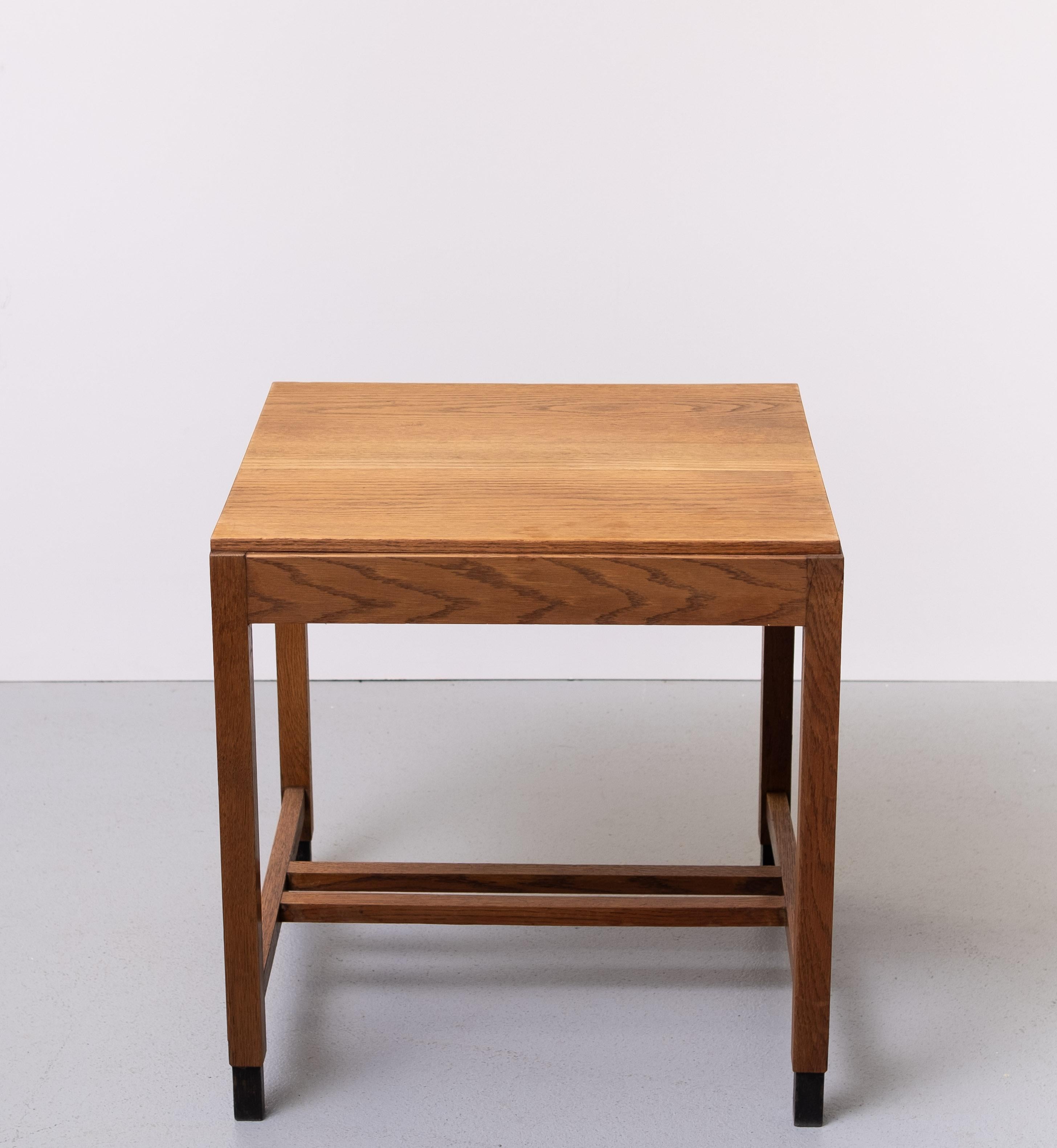 Very nice solid Oak side table or writing table or dining table 
Typical Amsterdam School style .  Minimalist and sleek design.