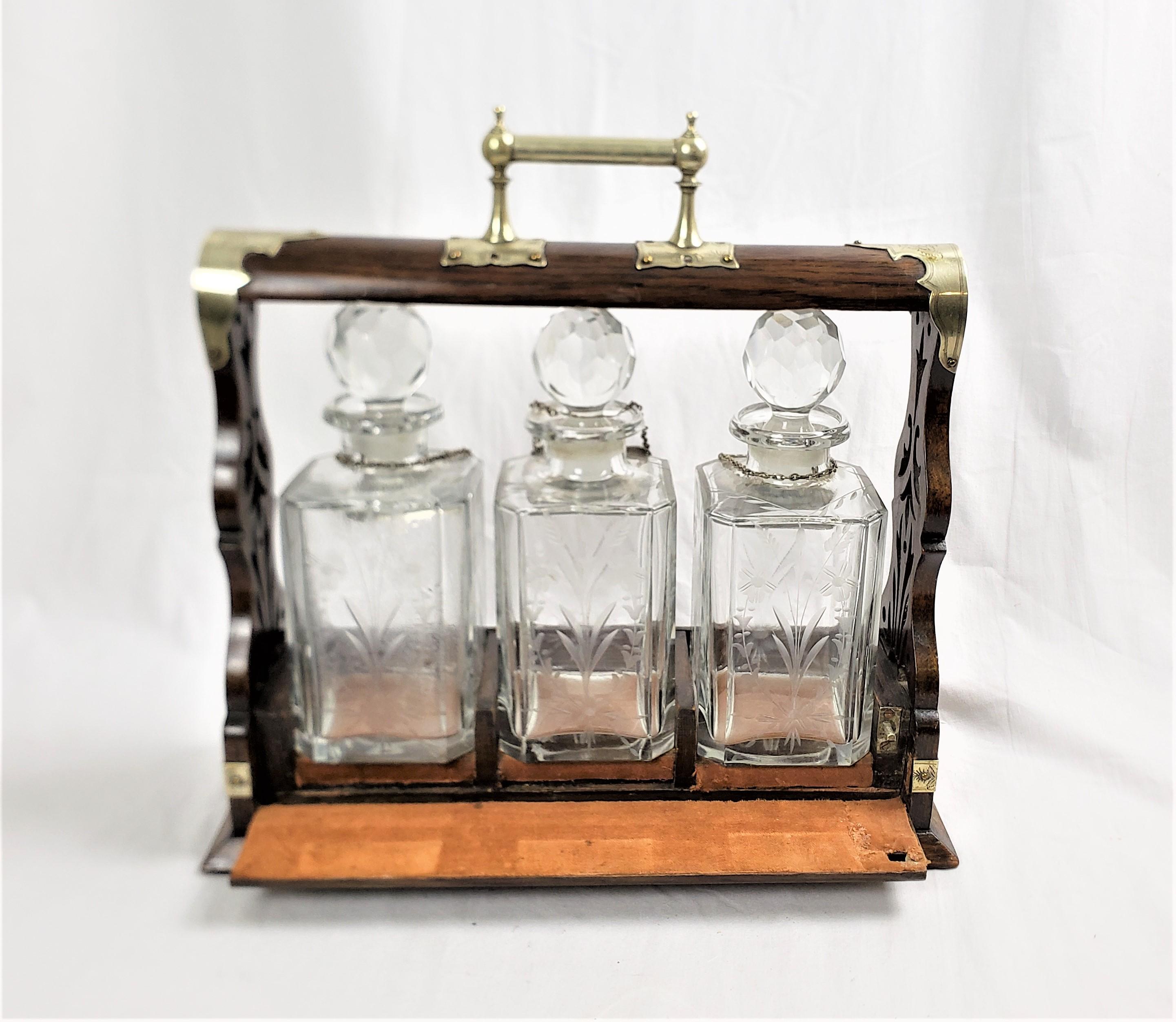 Metal Antique English Three Bottle Oak Tantalus with Etched Floral & Engraved Accents For Sale