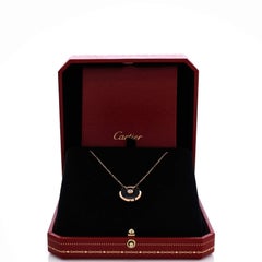 Collier pendentif « Amulette de Cartier » en or rose 18 carats, avec onyx et diamants (petit modèle)