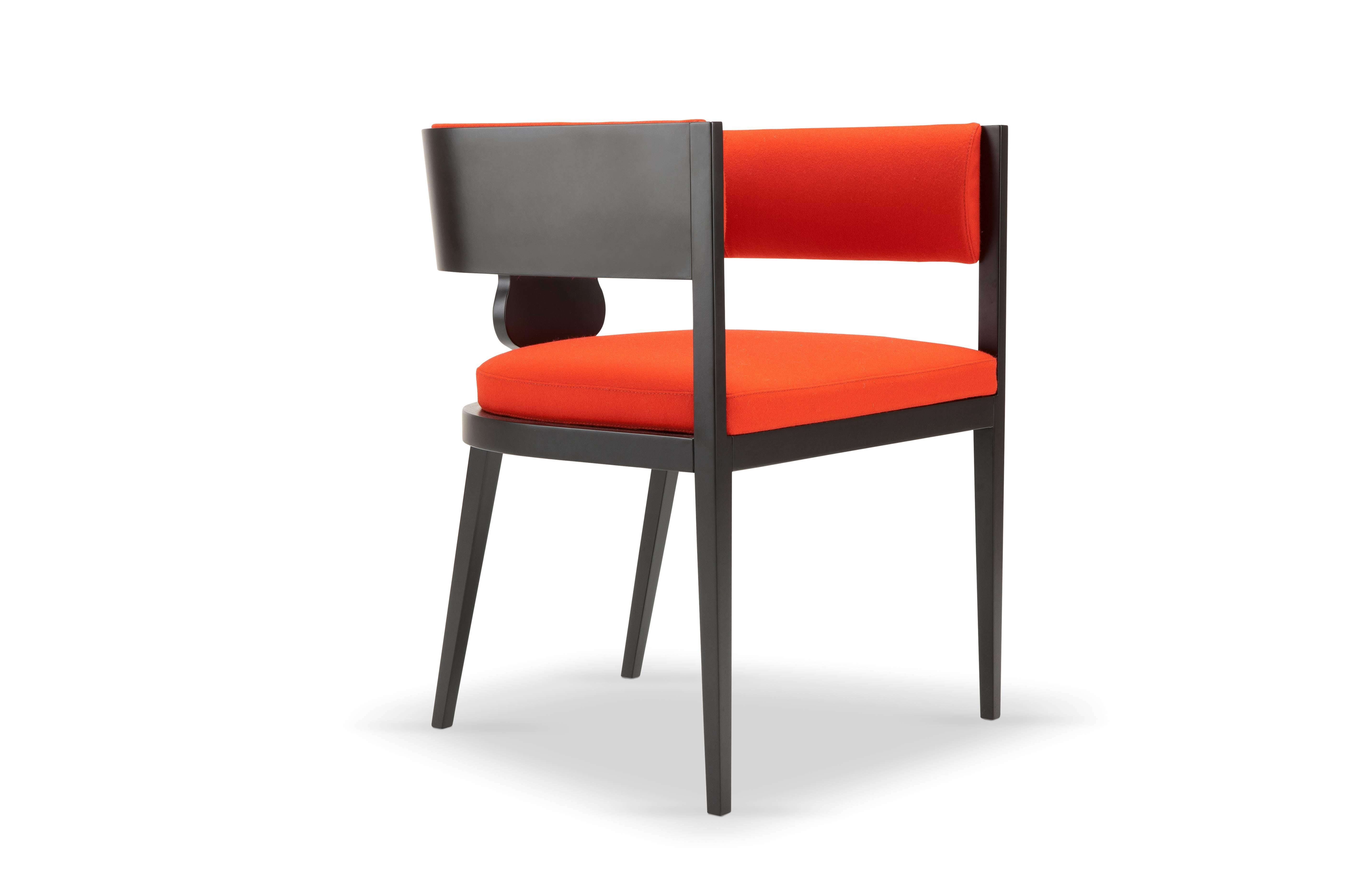 Lira

This armchair, or rather a tub chair, is elemental and timeless, with arms and backrest unified by a common height. It finds its characterization in the connection between the arm\back strip and the seat, linked through a wooden Silhouette