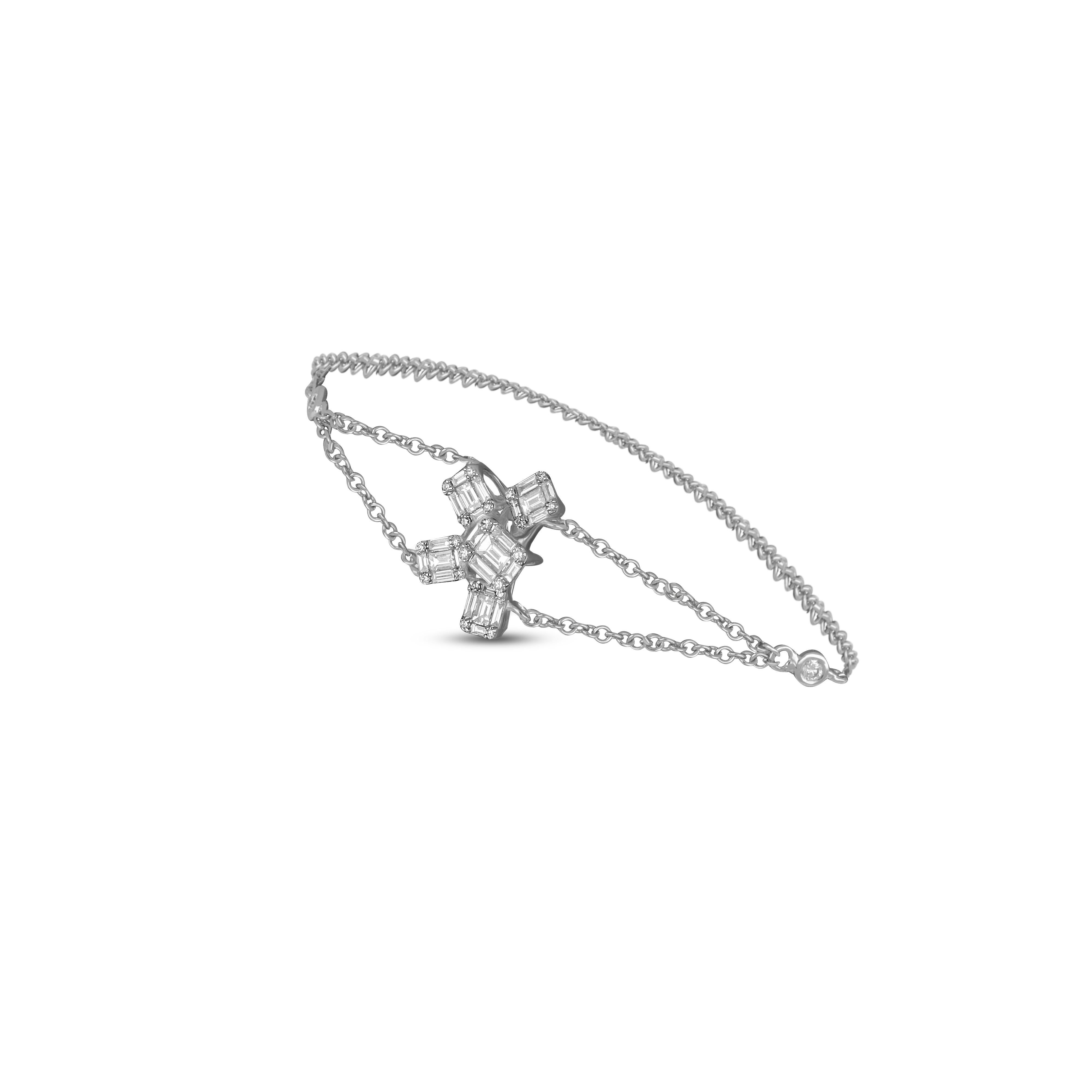 Brillante kleine Diamanten werden in einer minimalen Fassung in diesem 18 Karat Roségold präsentiert. Eine Reihe von Diamanten im Rundschliff umgibt das Handgelenk und bildet ein schlankes Birnenmotiv. Dieses zarte Schmuckstück kann allein getragen