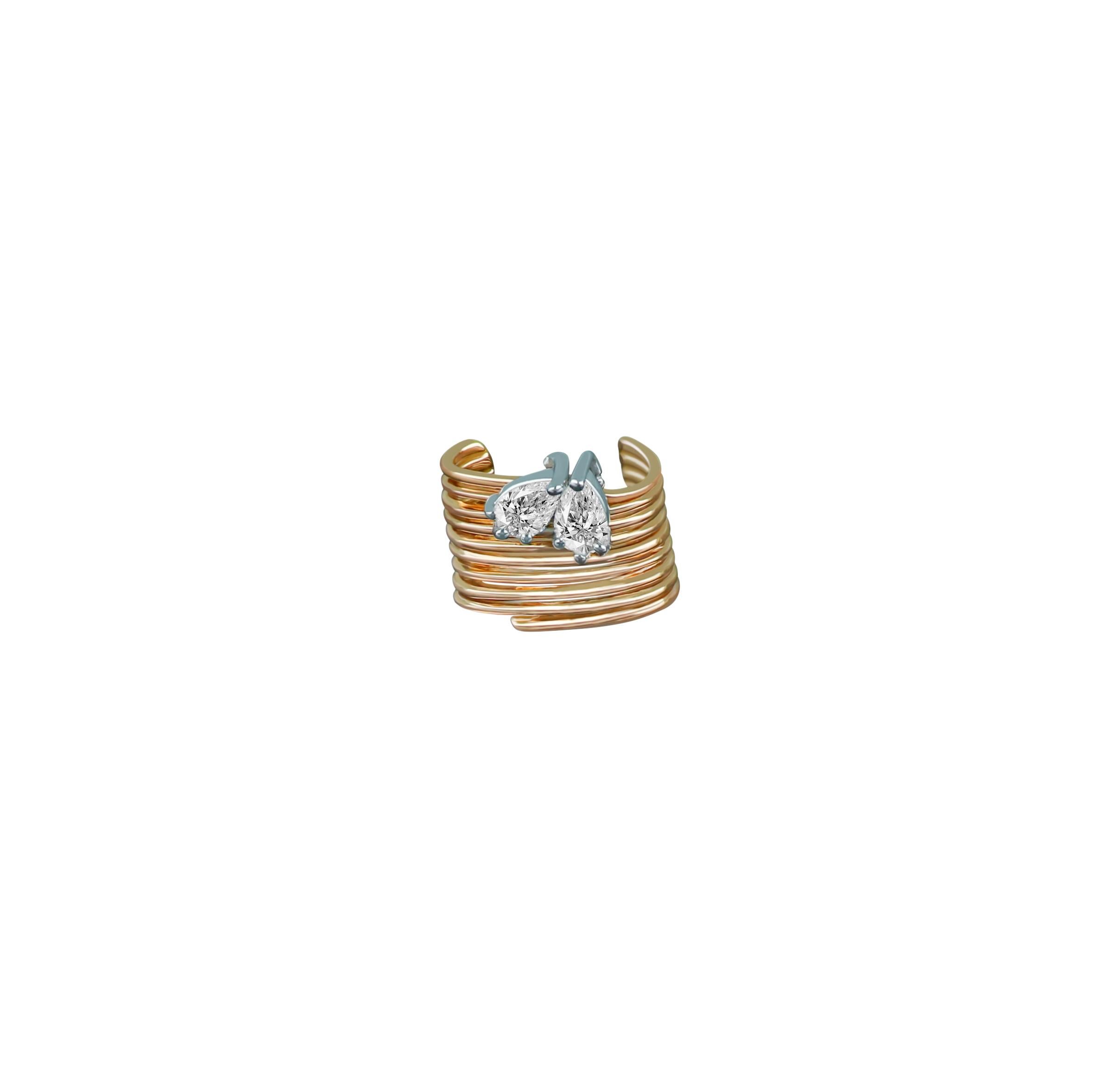 The heart motif in this 18 karat gold ear cuff is timeless romantic. Presented in 0.285 ct pear cut diamonds of extraordinary beauty, this rose gold creation is a symbolic take on Amwaj iconic ear cuffs. Crafted in minimalist setting, the purity of