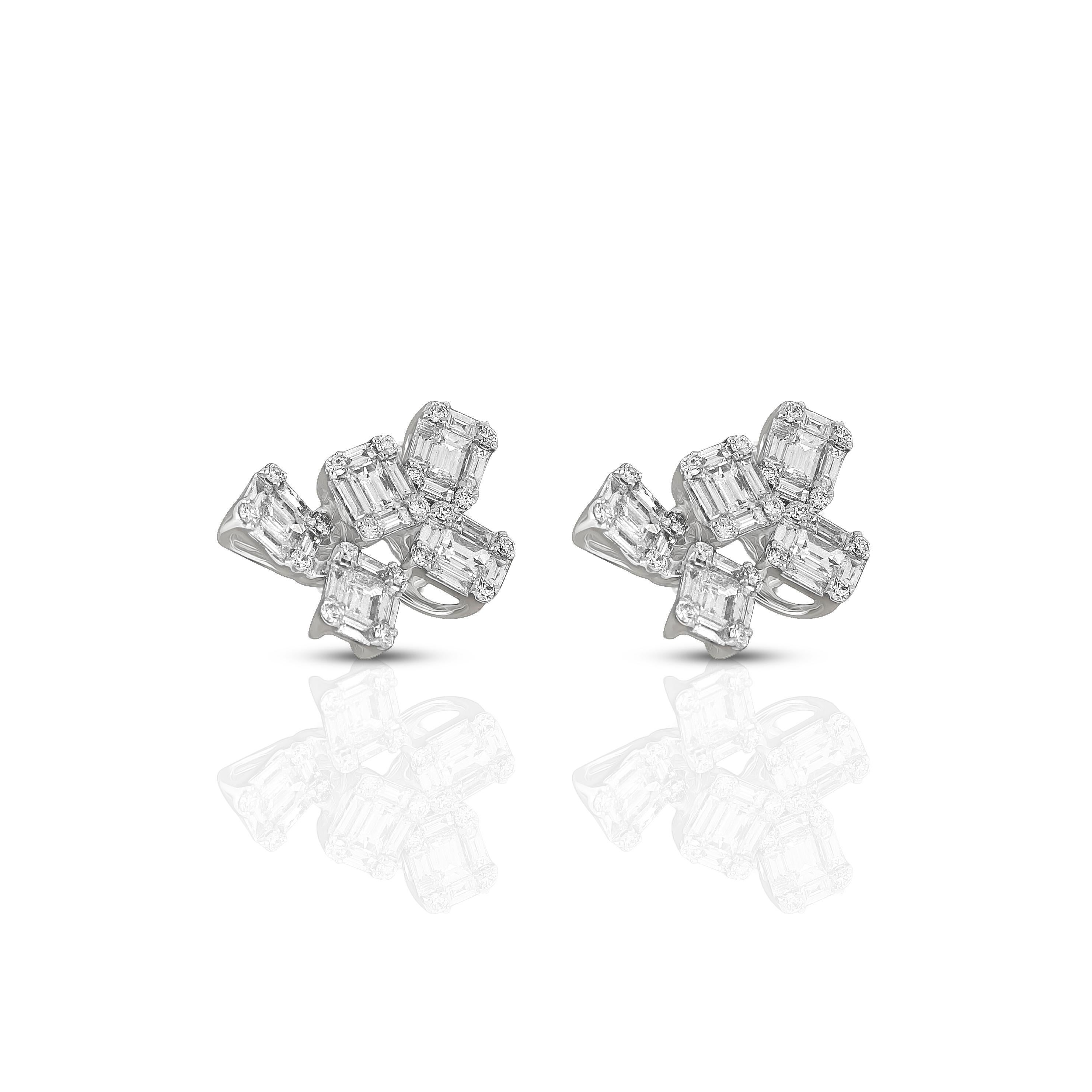 Amwaj stylish 18 karat white gold and diamond earrings that you will wear time and time again, feature a mix of round and baguette cut diamonds that are creatively set by Amwaj craftsmen. The earrings showcase the beauty of the most popular diamond