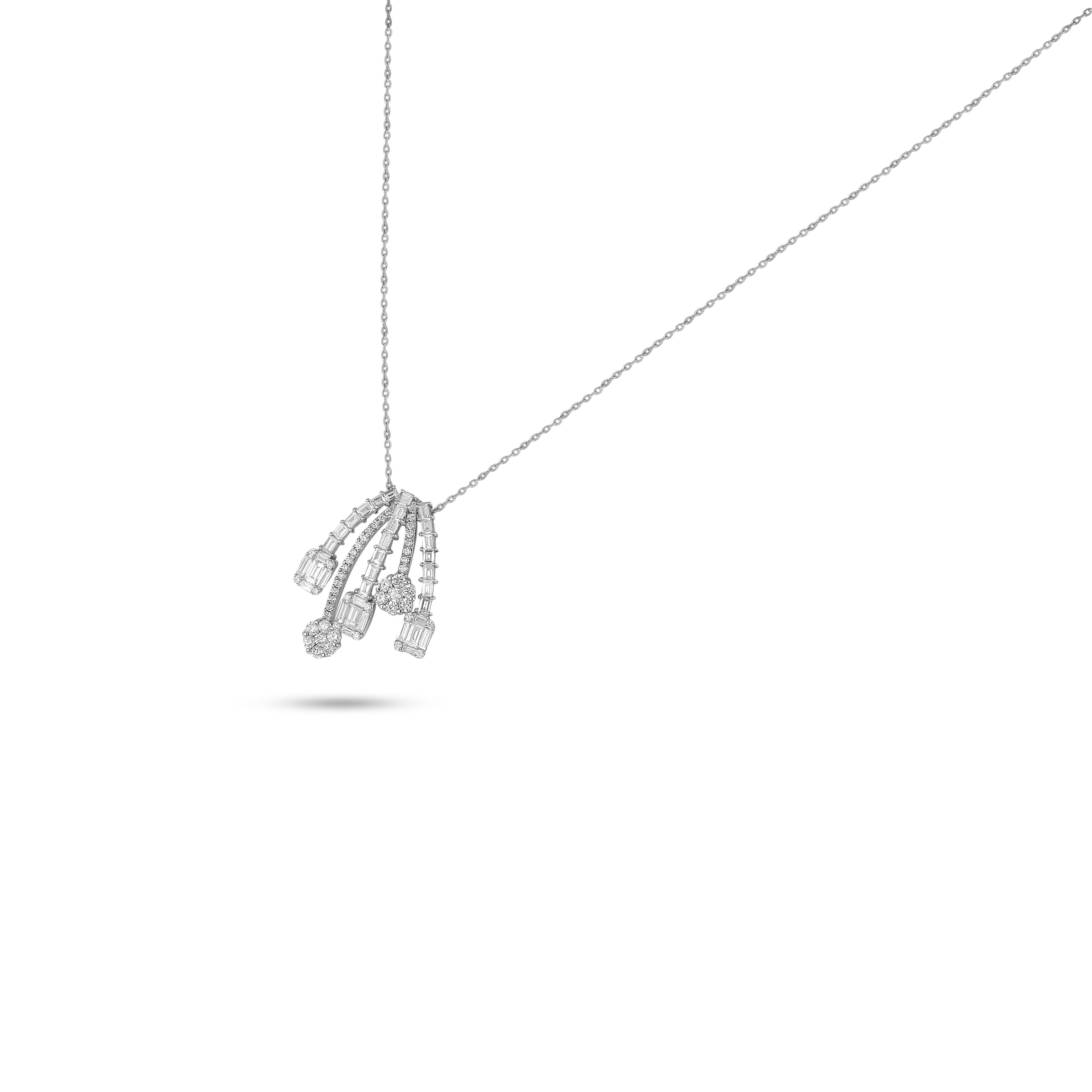 Suspended from a delicate 18 karat white gold chain, Amwaj diamonds pendant features multi cut diamonds set to form an elegant waterfall motif. Beneath is suspended a charming cascade of round and baguette shape diamond drops.
18 Karat White Gold