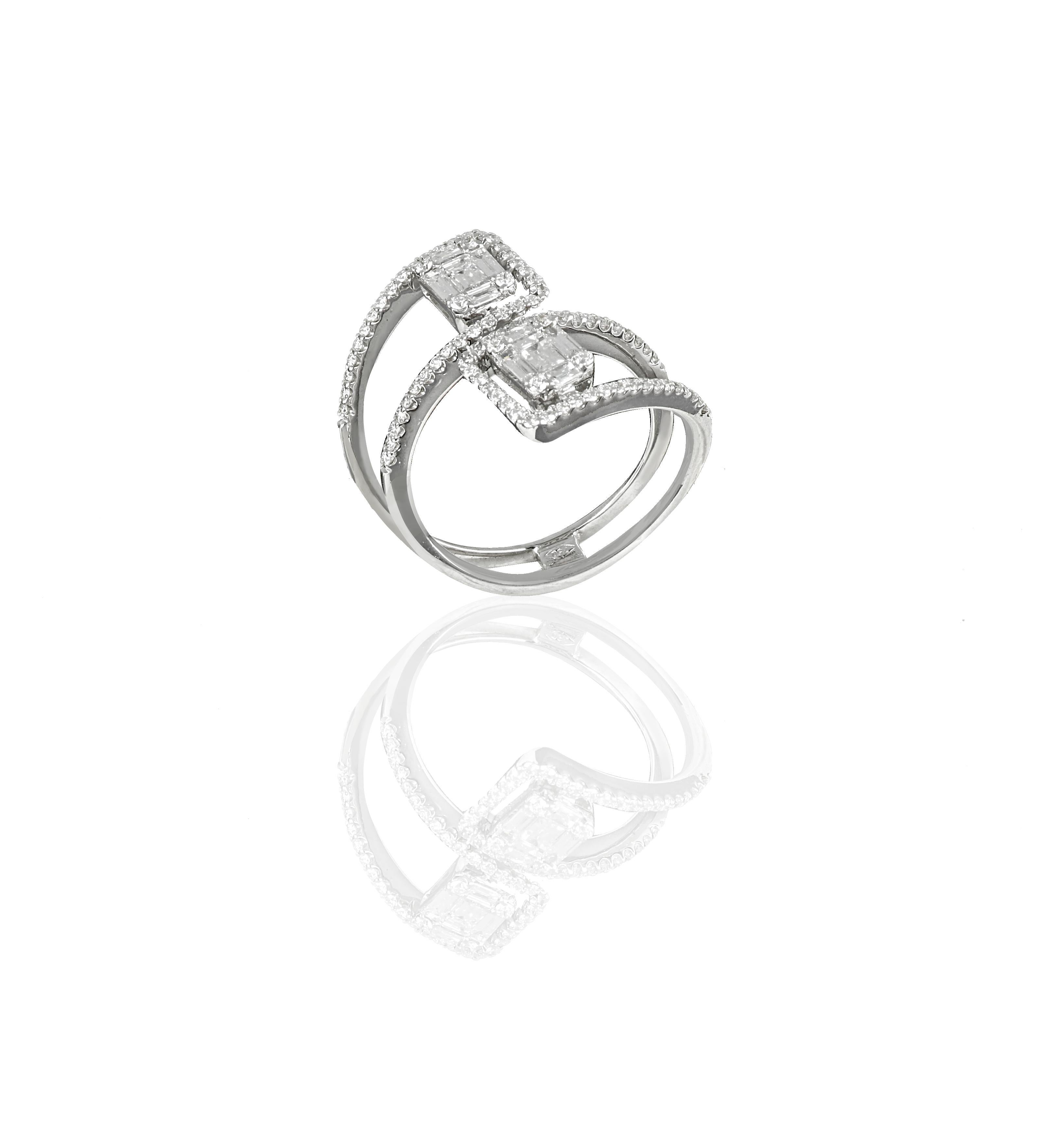 A duology of diamonds, this 18 karat white gold ring sets to form a charming band of round cut and baguette shape diamonds. Carefully placed so that the unique curves of each diamond sit gently on the top of each other
Diamonds (Total Carat Weight: