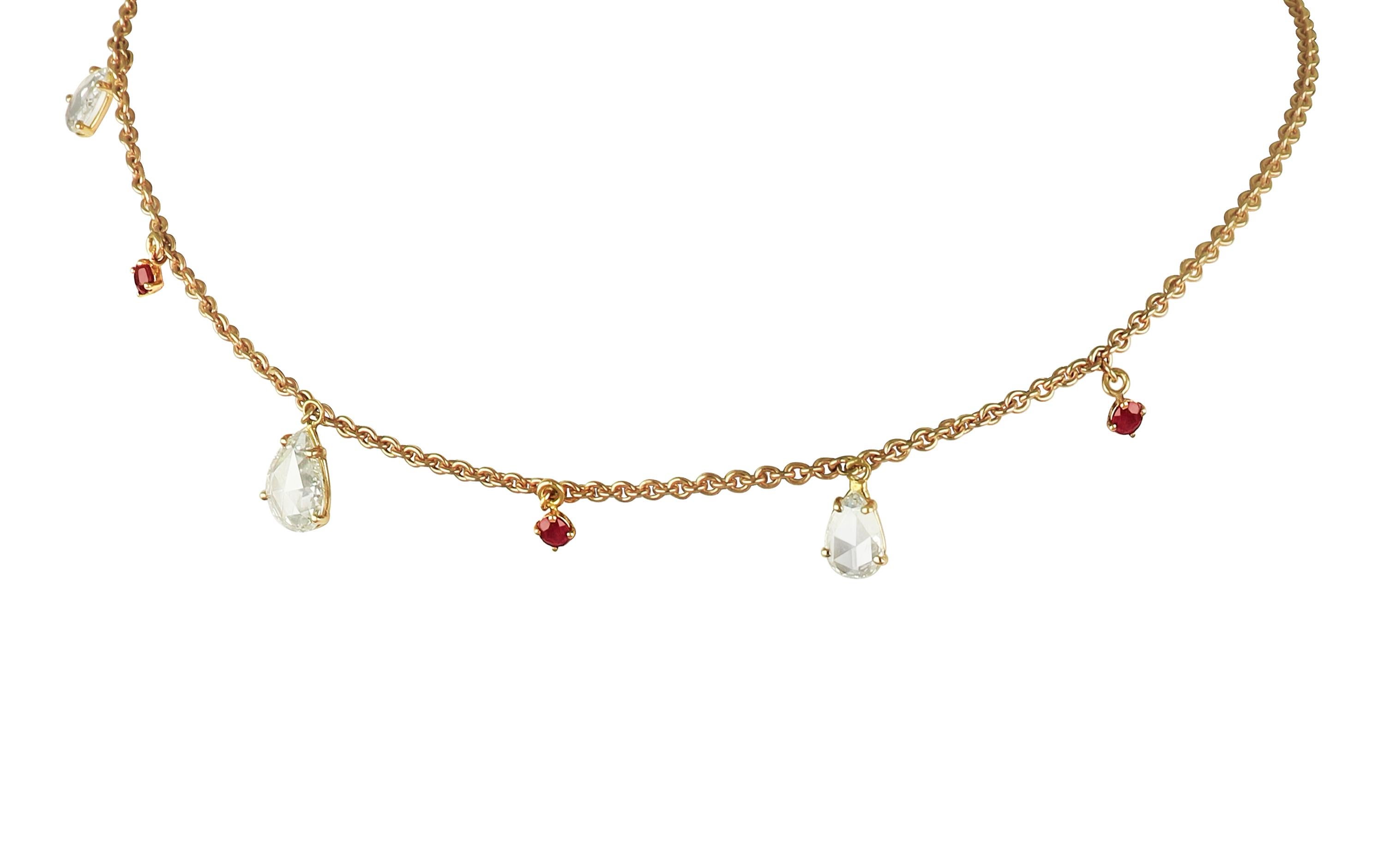 Beautifully designed for complete comfort, the design of Amwaj 18 karat rose gold drops choker is a contemporary classic. Pear shape rose cut diamonds suspend from delicate rose gold chain that encircles the neck, with round ruby nestled between