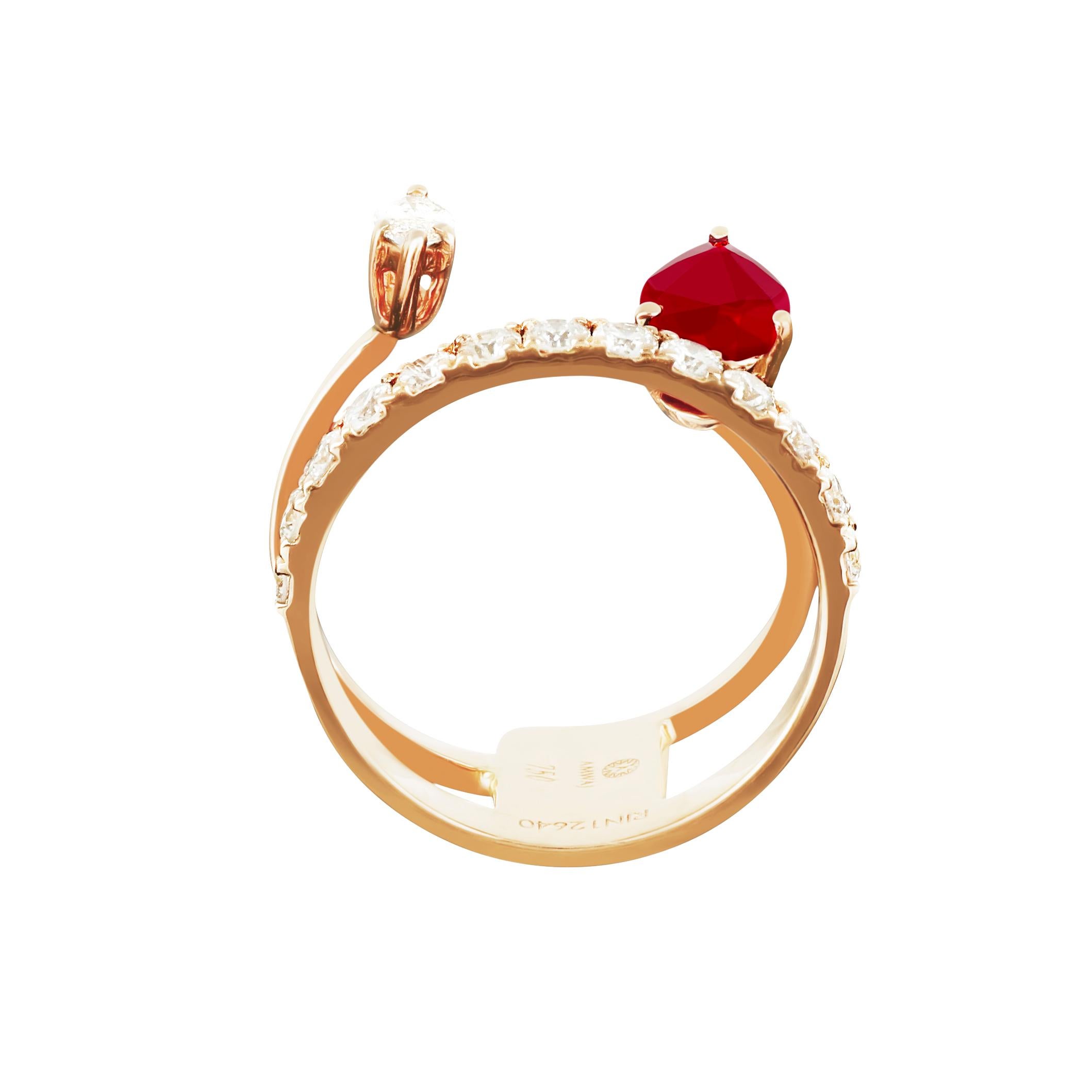 Capturing the beginning sparkle of every love story, this 18K rose gold ring by Amwaj jewellery evokes the tale of that initial spark, set with marquise and round cut diamonds and pear cut ruby. 
Diamonds (Total Carat Weight: 0.68 ct)
Ruby (Total