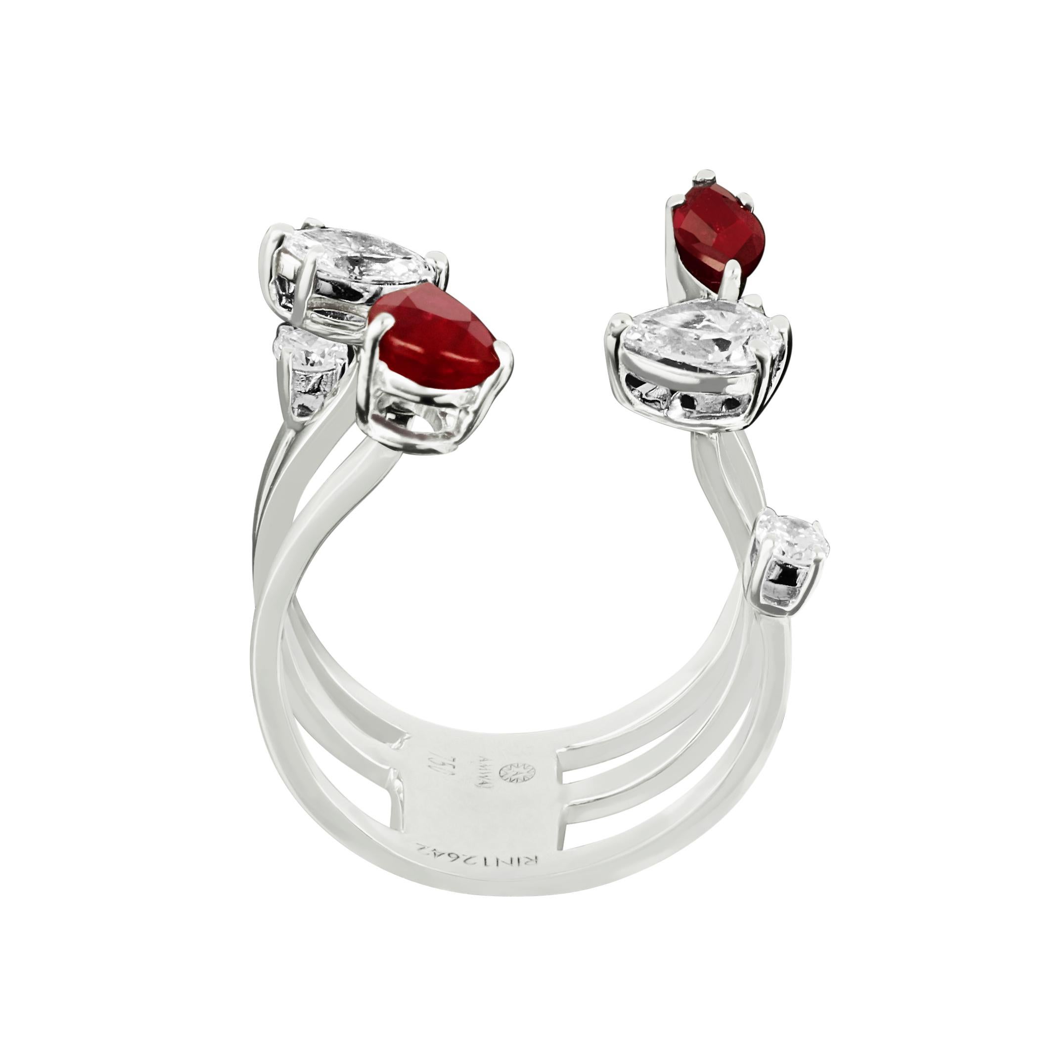 Show your love to her, the creative setting of this romantic 18 karat white gold ring by Amwaj jewellery leads the eye to a carat ruby. The shade of red is intensified by its sleek pear and marquise cut, which draws the eye into its profound depth