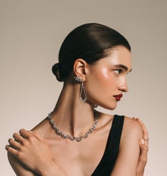 Collana in oro bianco 18k con diamanti taglio baguette e rotondo