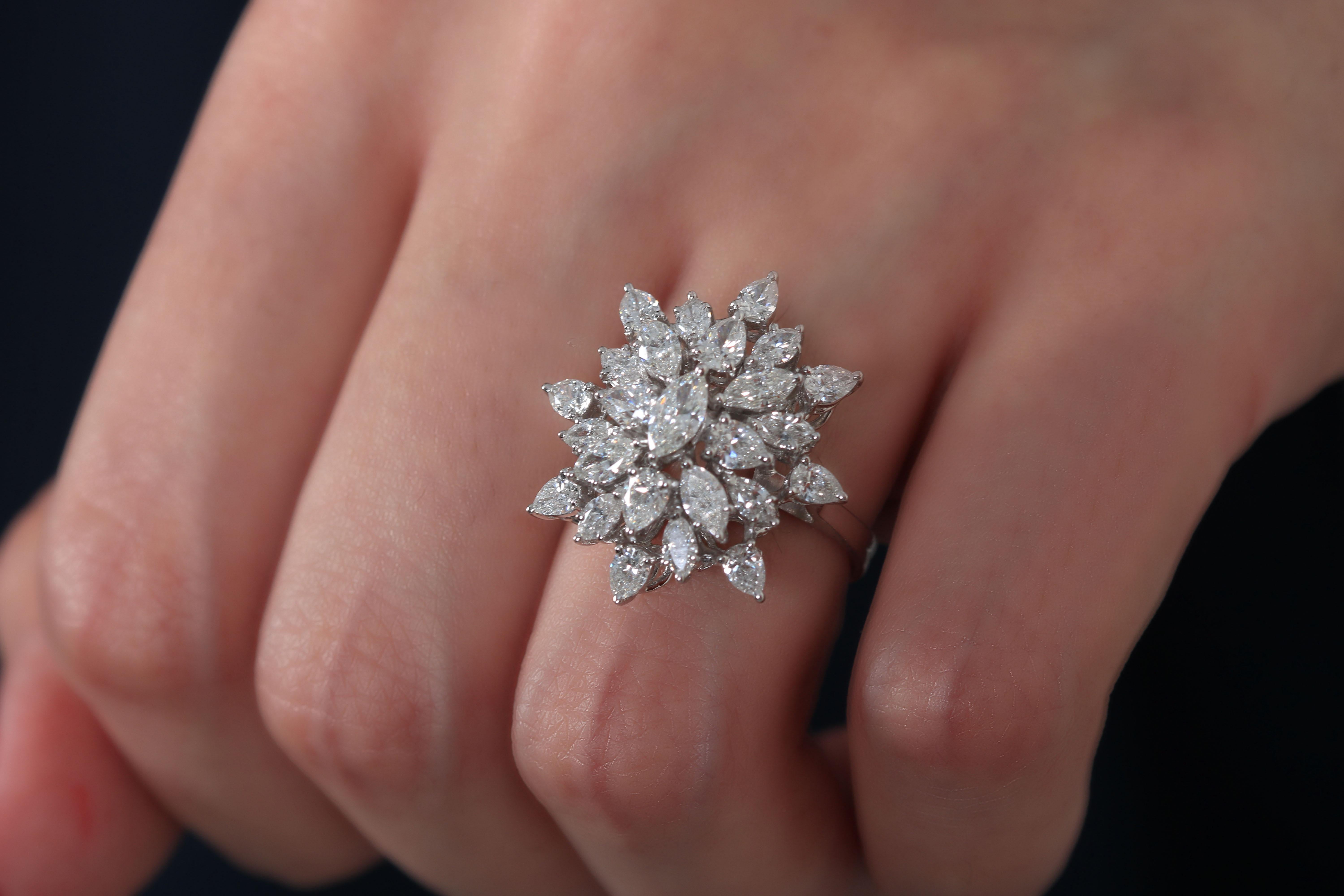 This diamond ring by Amwaj Jewelry features pear shape and marquise cut diamonds. Just intricate and dazzling, a perfect piece for any occasion.  

Diamond Clarity: VS SI / G H COLOR
Diamonds (Total Carat Weight: 3.05 ct) 
18 Karat White Gold
Ring