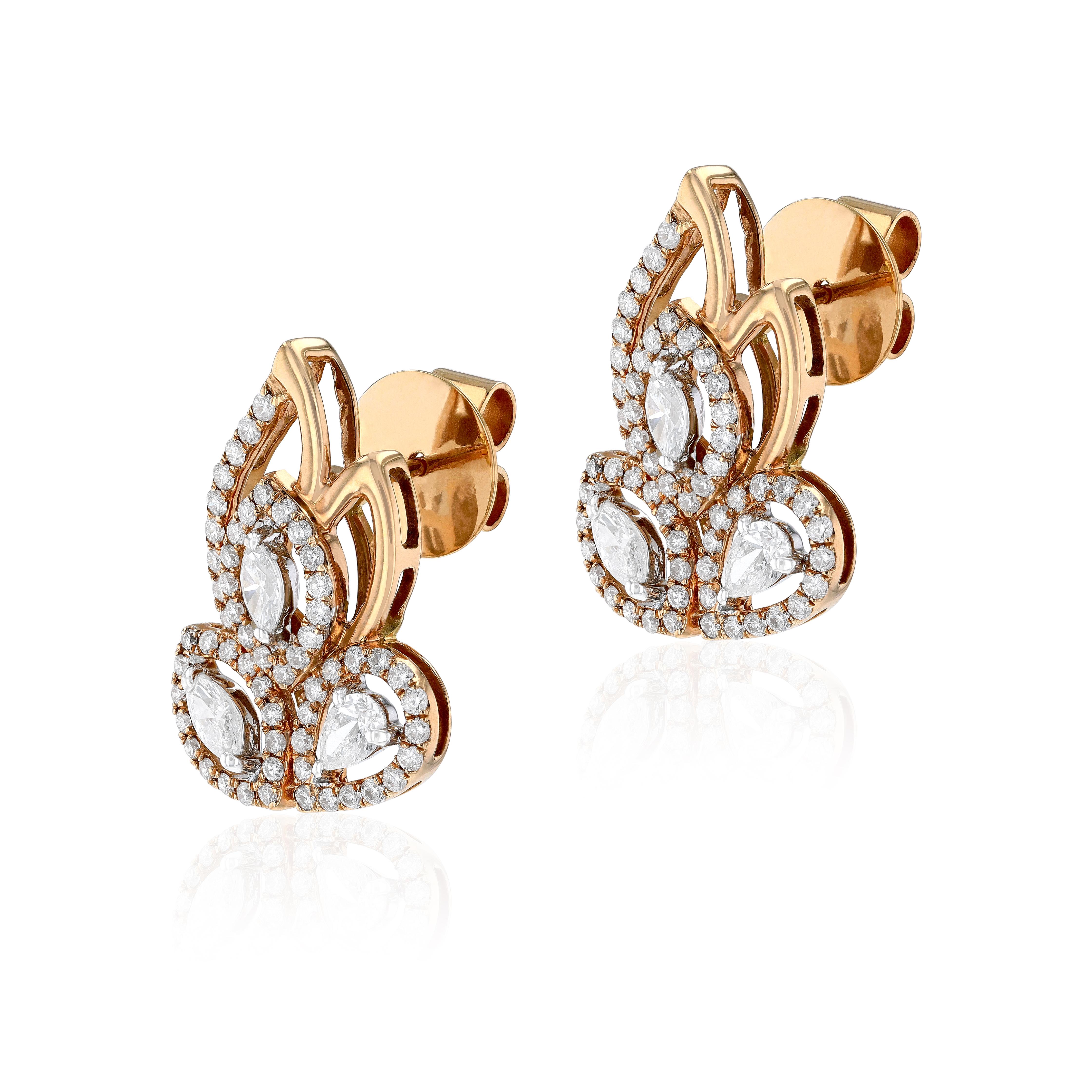 Combining exceptional artistry with extraordinary craftsmanship, our inspired by leaves earrings feature round, pear and marquise cut diamonds, set to form swirls of glance. Suspended from each are three beautifully articulated slices of pear and