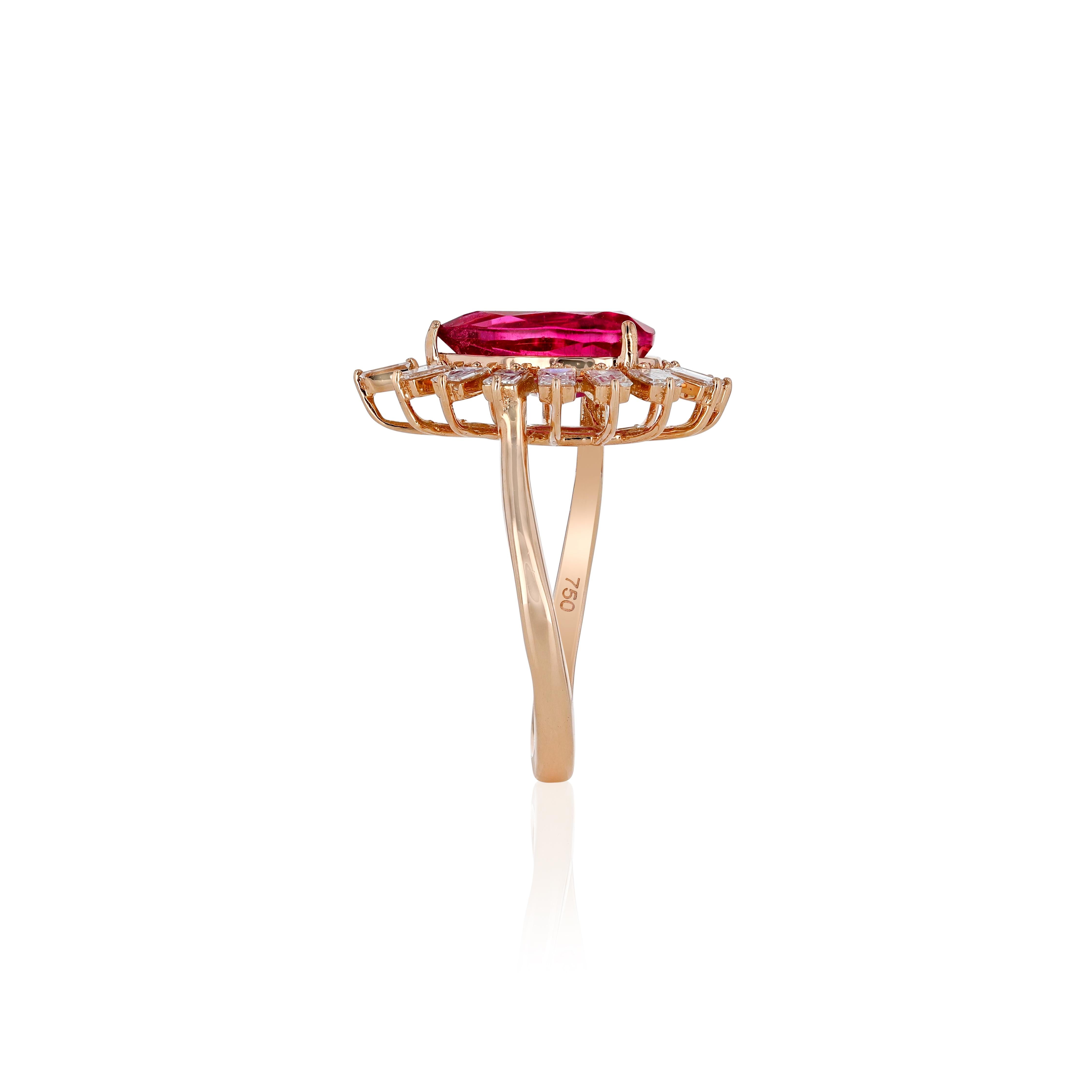 Amwaj jewellery extraordinary fancy pear shape tourmaline rose gold ring is admired for its phenomenally vibrant hue and exceptional radiance. The deeply feminine shade of pink is strikingly surrounded by with baguette cut 3.77 carat diamonds,