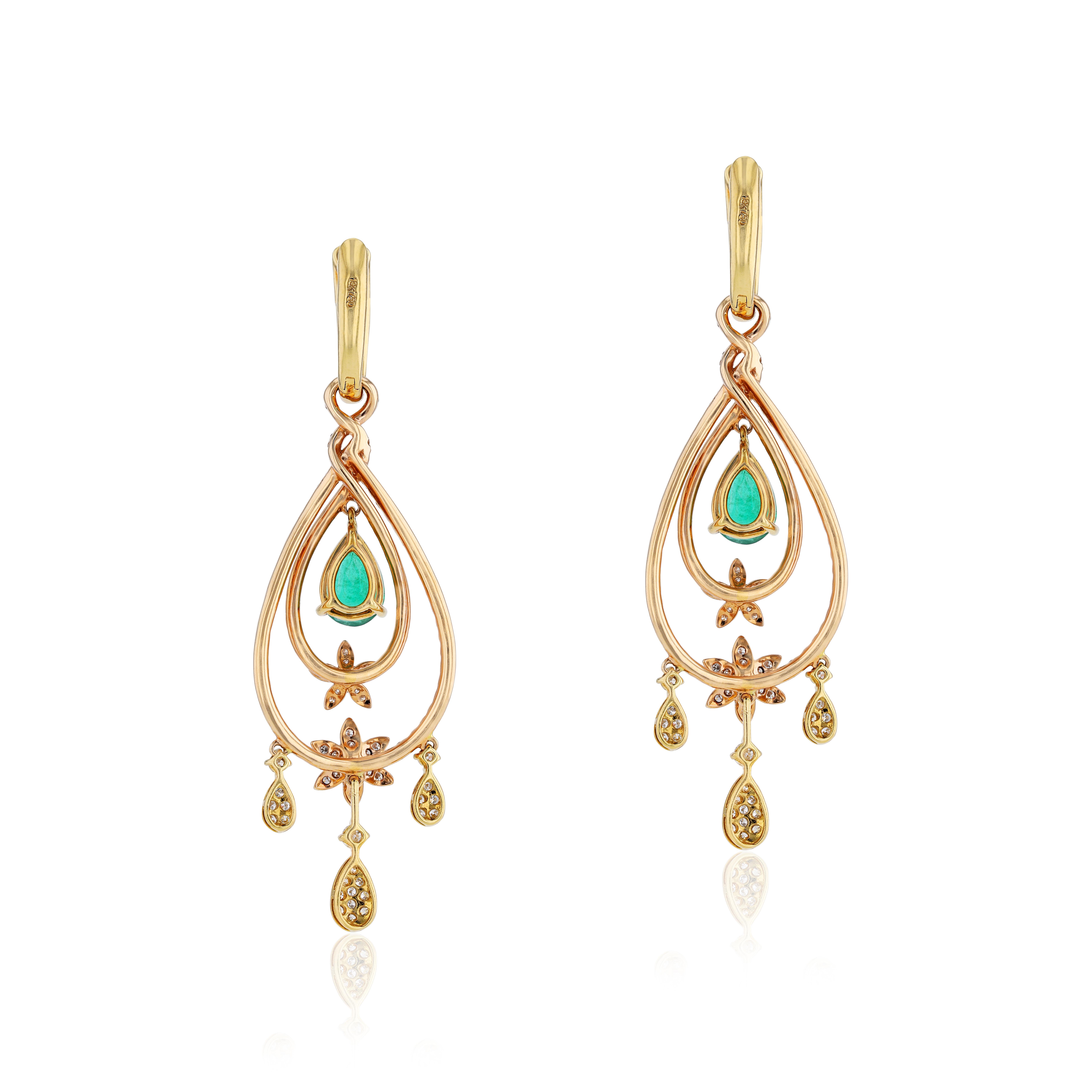 A charming display of color and brilliance, these sensational 18 karat rose gold chandelier earrings by Amwaj Jewelry exult the beauty of 4.03 carats round cut white diamonds, set with 3.49 ct pear shape emerald to optimise their uniquely