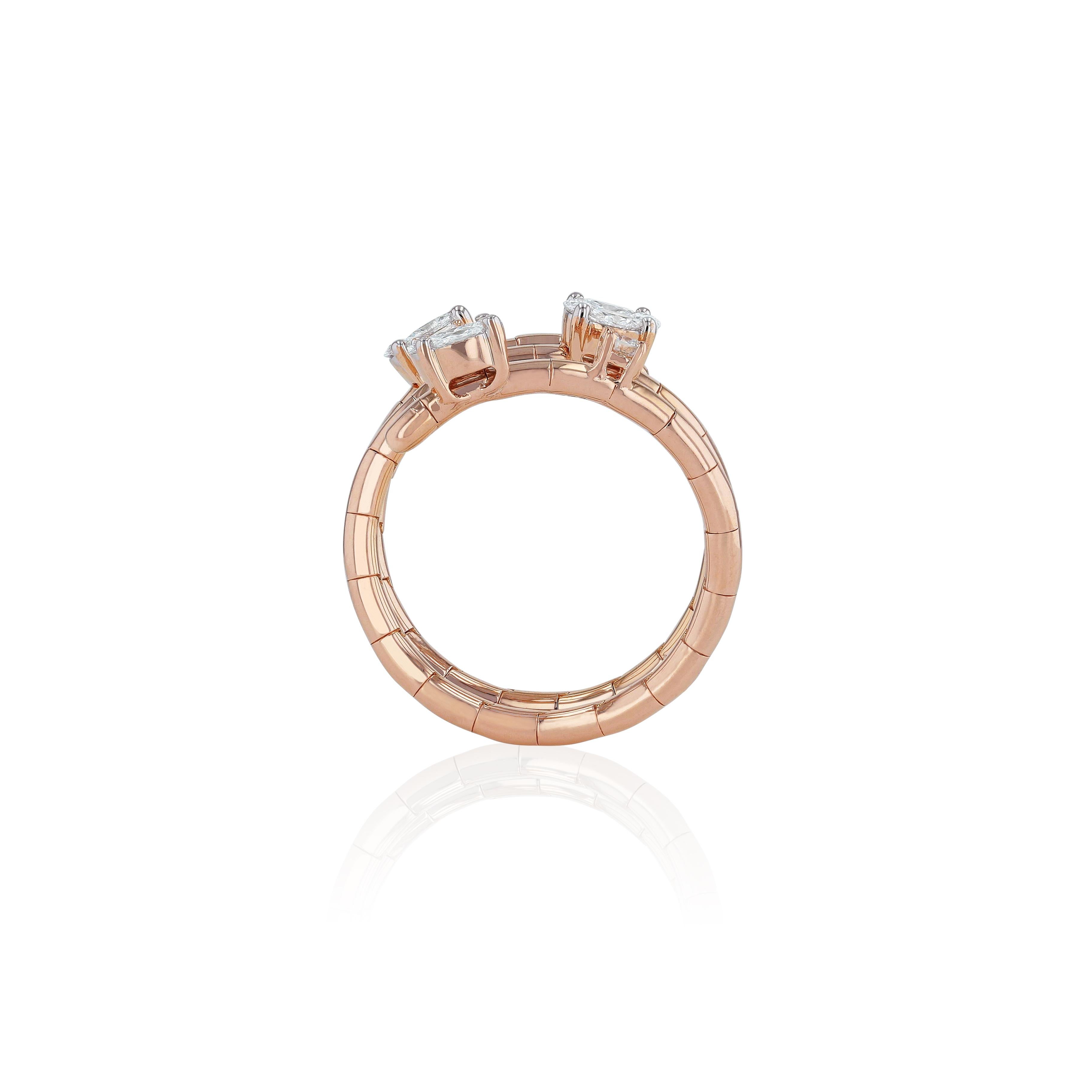 A contemporary design celebrating our imaginative masterpieces, placing 6 small to medium round exquisite round diamonds either side of the finger, arranged into potent layers of rose gold. 
Diamond Clarity: VS SI / G H COLOR 
Diamonds (Total Carat