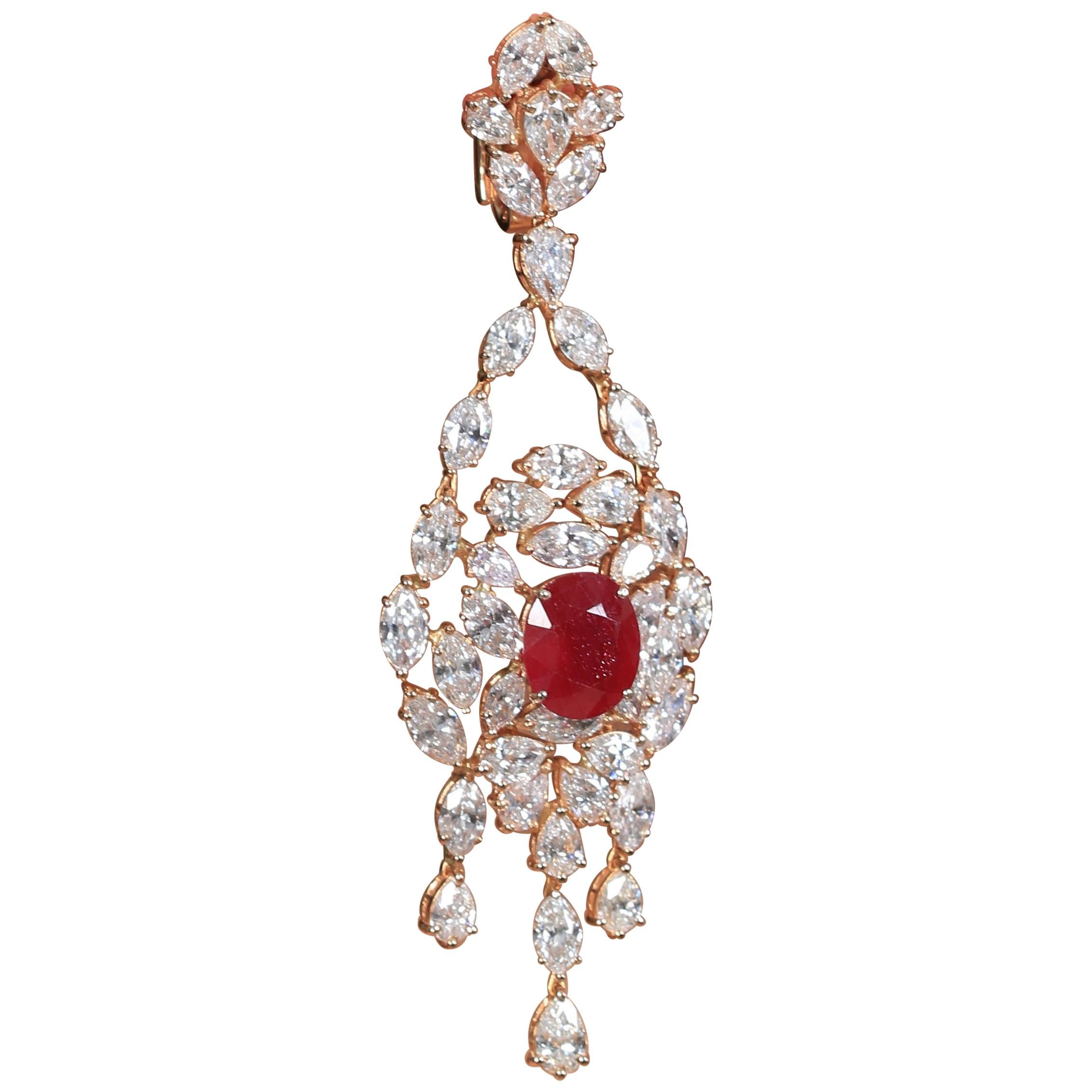This rose gold earrings by Amwaj Jewelry presents an inspirational imperial design featuring 12.39 carat round African ruby surrounded by a medley of fine marquise and pear shaped diamonds.

Diamond Clarity: VS SI / G H COLOR
Diamonds (Total Carat