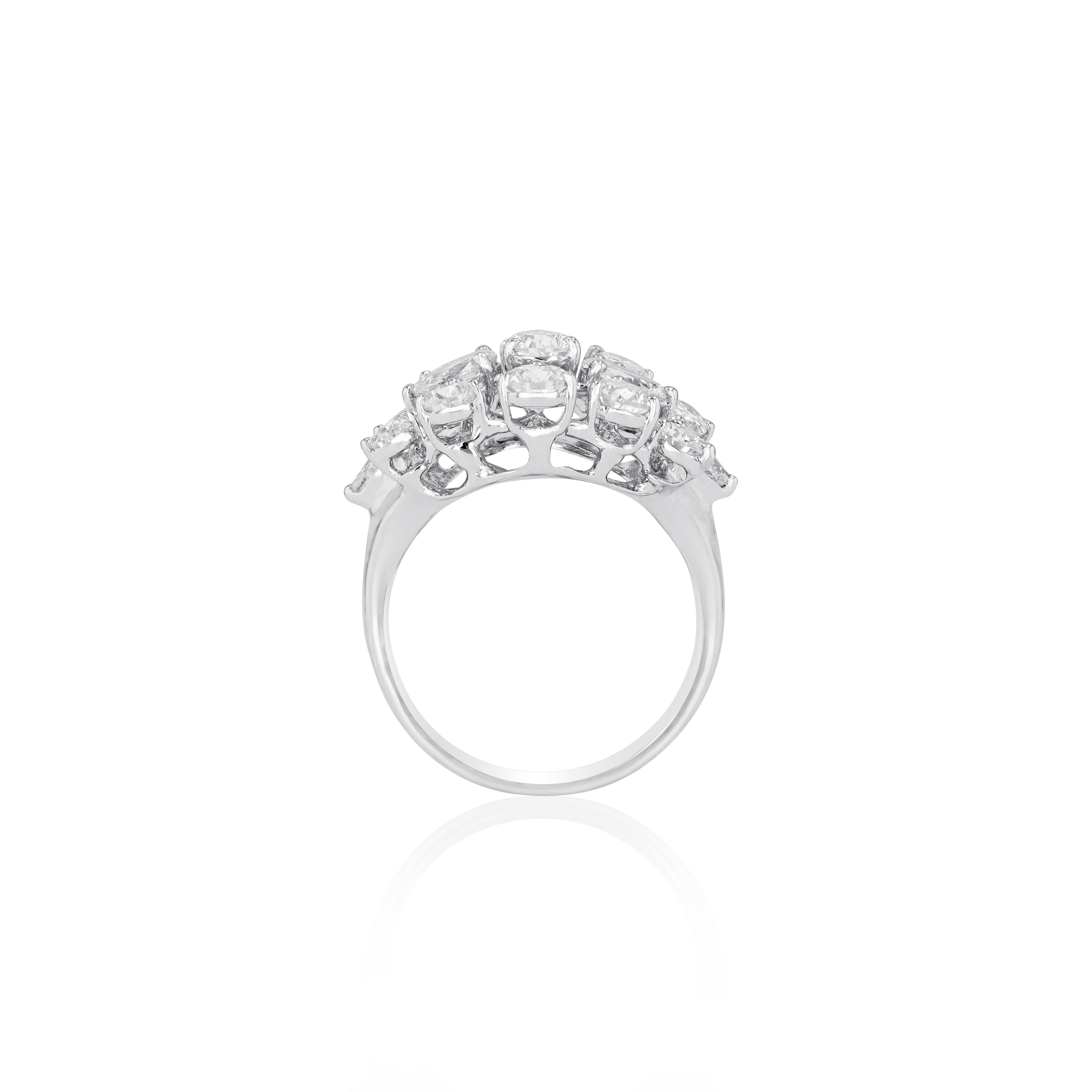 A tribute to refined elegance, the classic style of this pear shape diamond ring allows the precision and beauty of the  diamonds to assert itself. A jewel to celebrate the best moments in life, glowing with the radiance of love and pure passion.