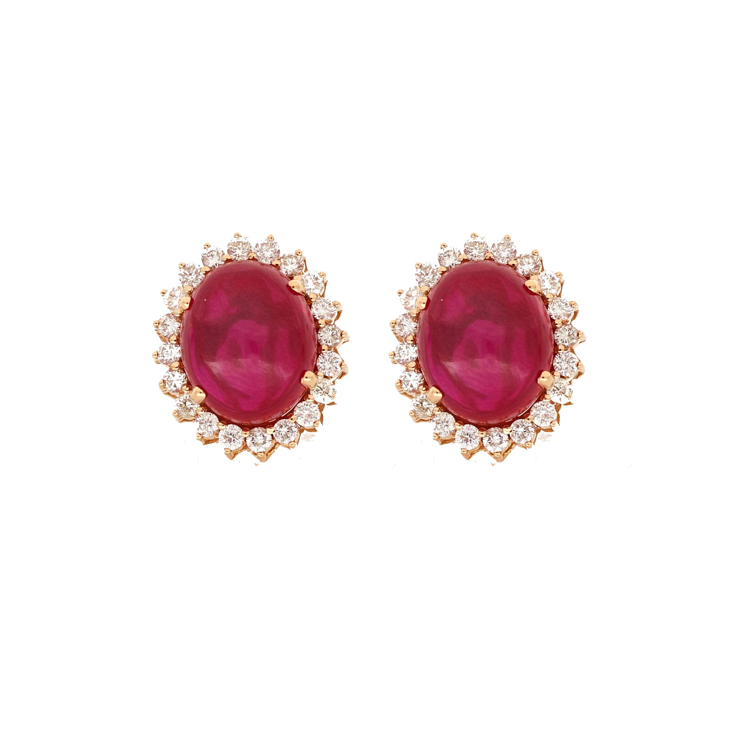 Two remarkable oval cut synthetic rubies weighing 14.45 carats have been perfectly matched in these classically elegant rose gold earrings by Amwaj jewellery, encircled by an array of sleek round cut diamonds.
Diamonds (Total Carat Weight: 1.03 ct)