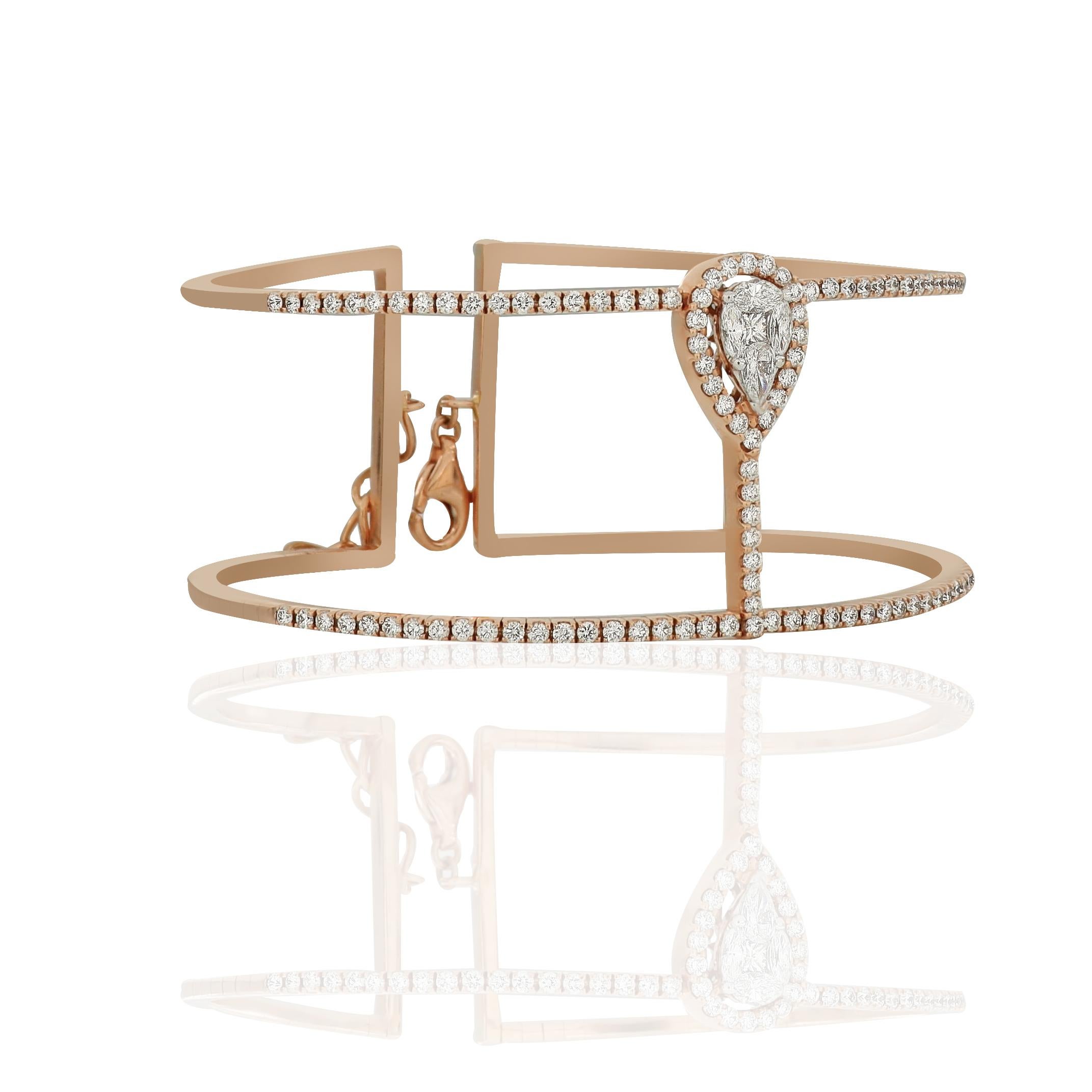 Amwaj high jewellery bangle in 18 karat rose gold is designed to embrace the wrist with exquisite brilliance. Round diamonds emphasize the design's dramatic layers. Grouped by a striking array of round, marquise, pear and princess cut diamonds that