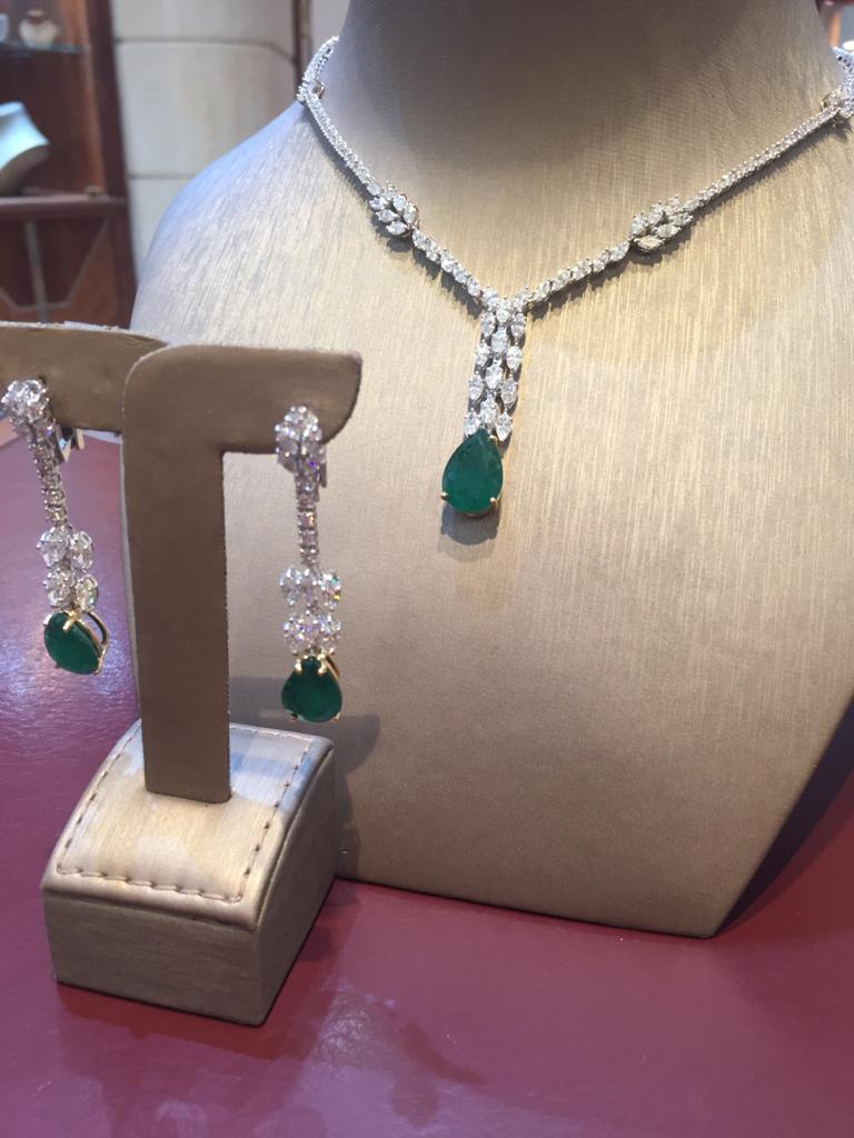 Marquise Cut Amwaj White Gold 18 Karat Necklace and Earrings with Diamonds and Emeralds For Sale