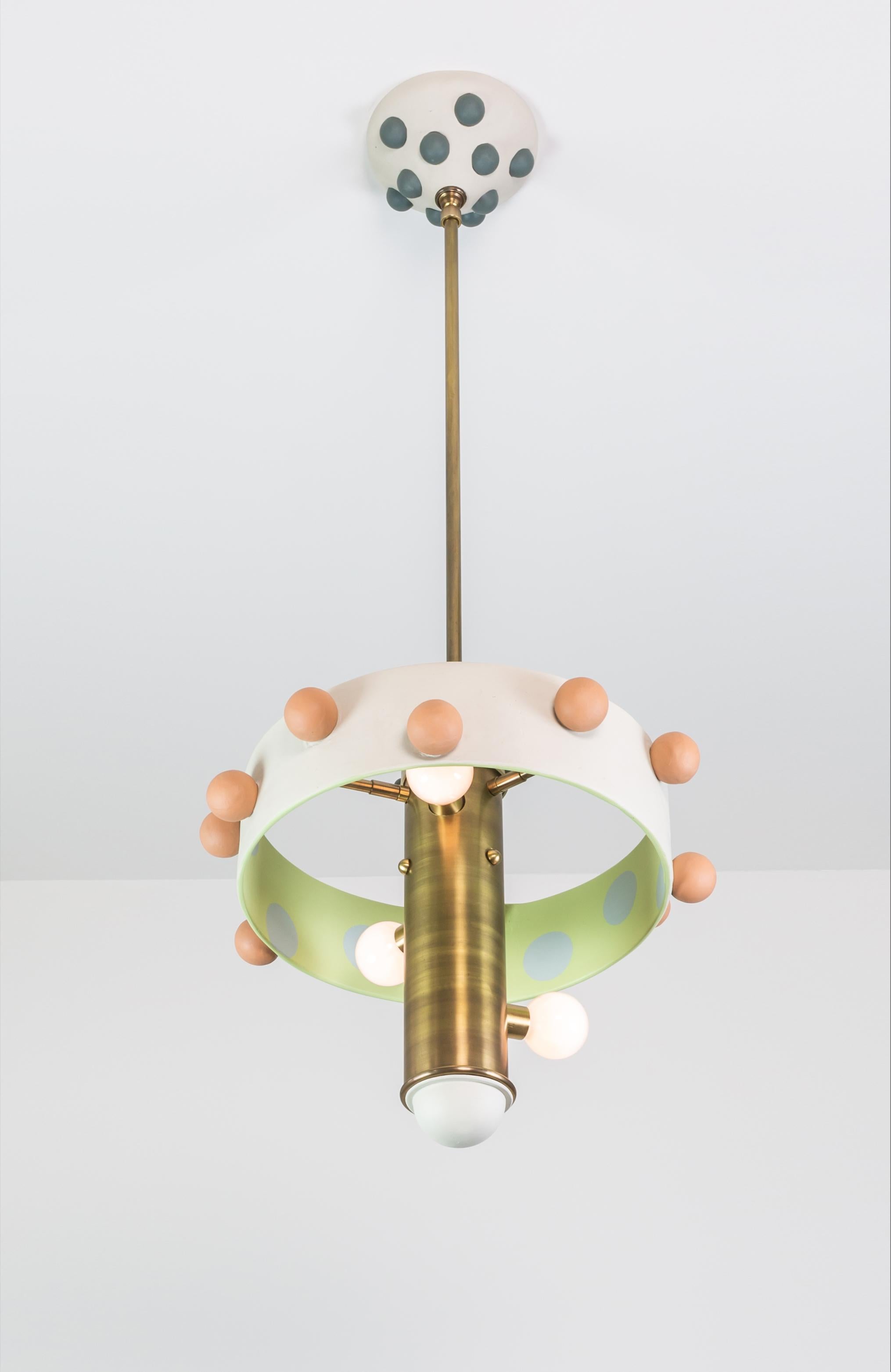Amy is a pendant light, part of the Posse collection; a system designed around the core ideas of collaboration and play.

The pendant is created to give the customer freedom in tailoring their own expression. The design is centered around a common