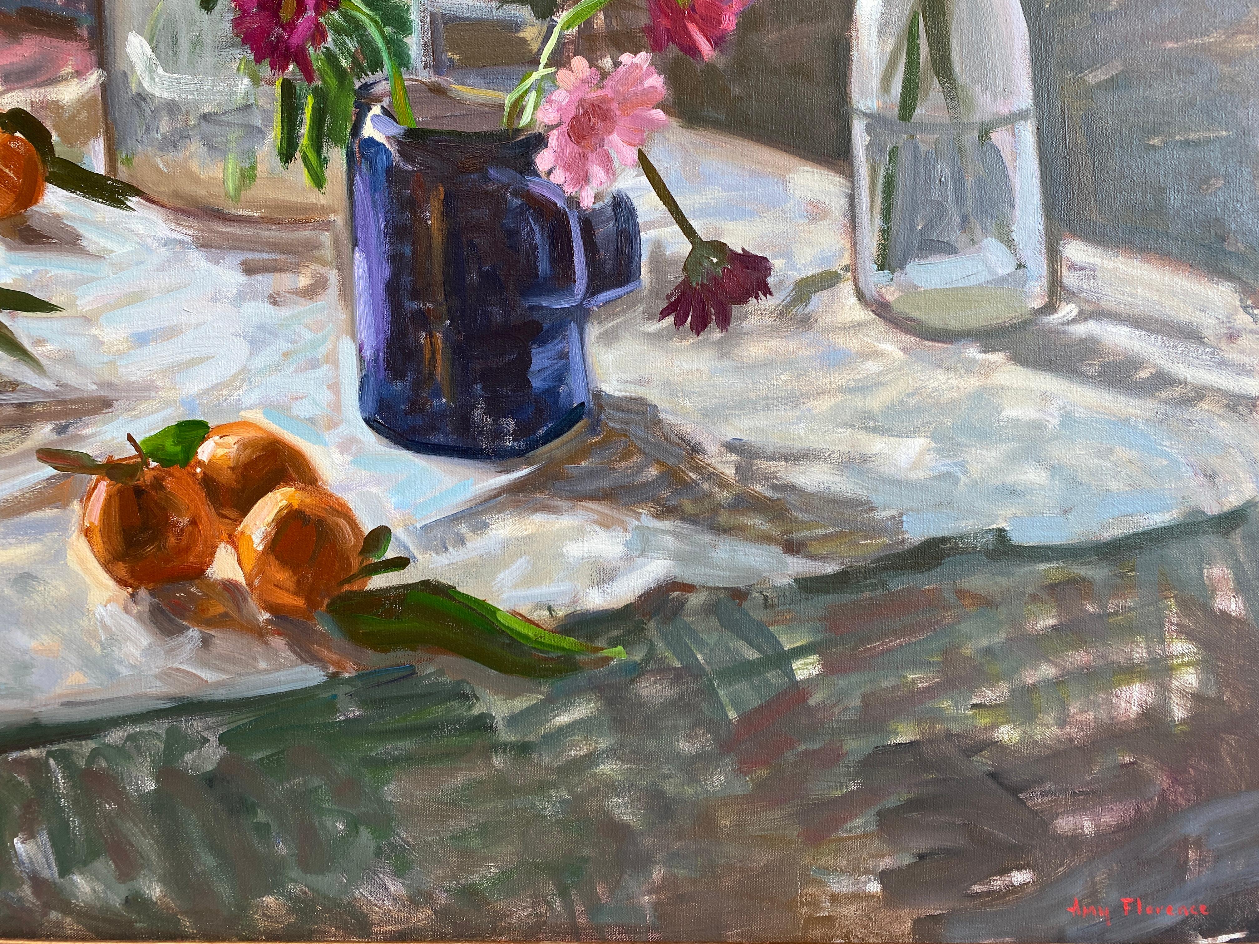 Florence skillfully creates a a dark interior flooded with the bright Tuscan light from the open window. The outside is brought in not only by the light but by the fresh cut flowers casually resting different sized glass jars.

Framed Dimensions: