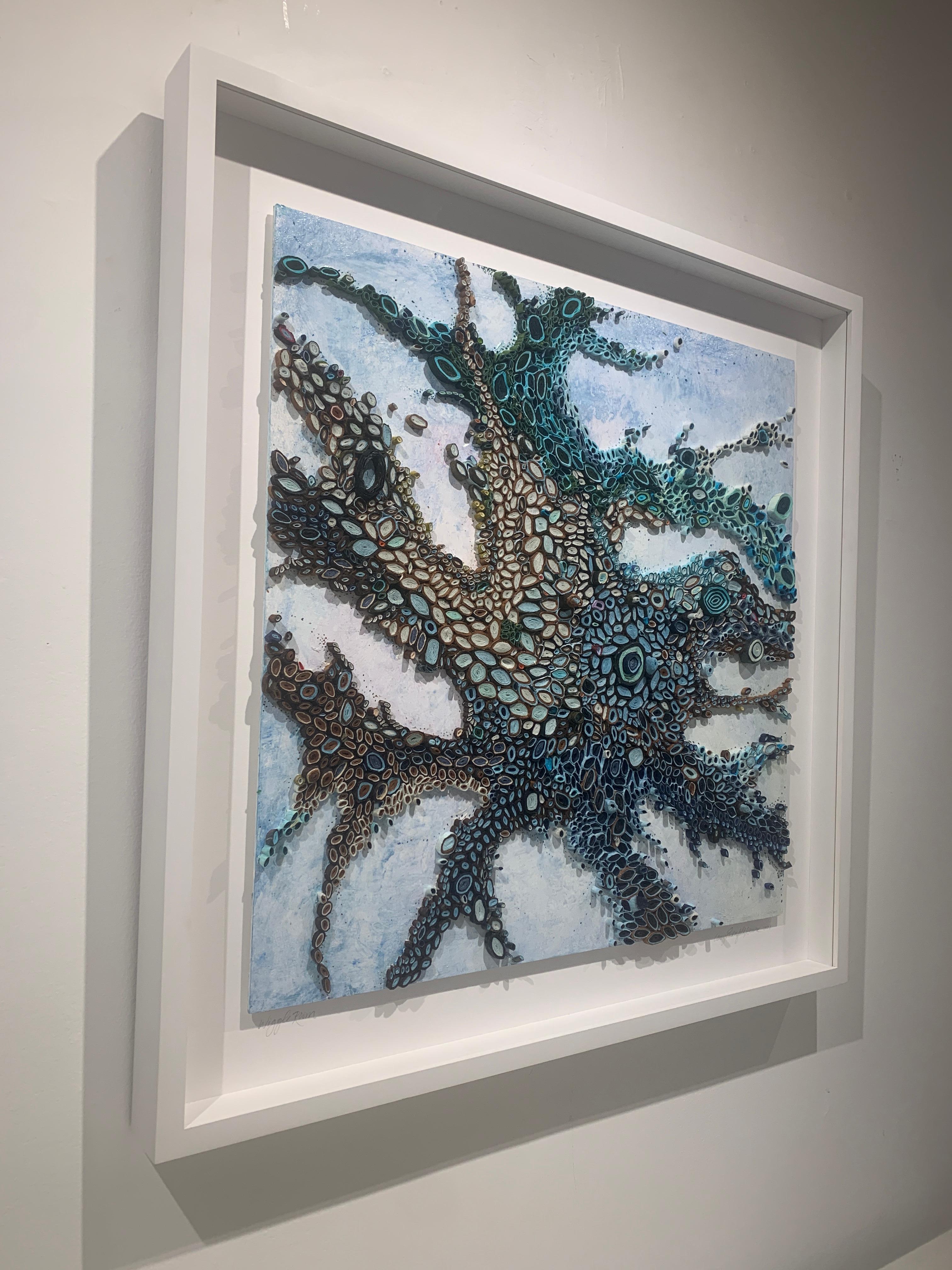 Mixed Media artist Amy Genser makes dimensional paper collages. These colorful, textural, one-of-a-kind wall pieces embody movement and processes. She masterfully manipulates paper -- each piece being cut, rolled and stacked -- to mimic organic