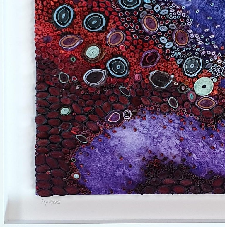 Pop Rocks is a unique medium size contemporary modern sculpture painting relief by US artist Amy Genser. The relief is made from hundreds meticulously hand rolled rice paper elements that are carefully mounted on a painted wooden panel. The art work