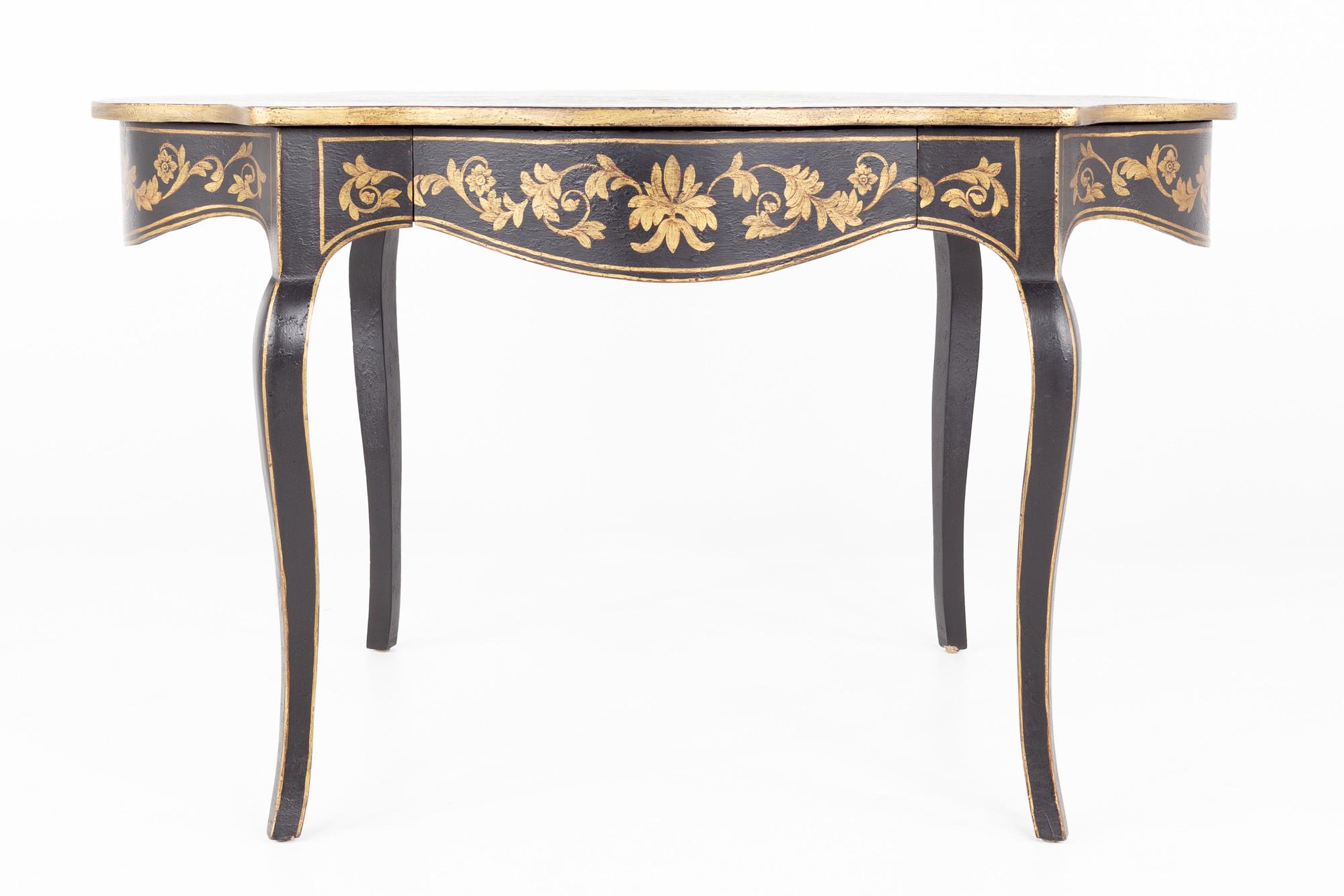 Amy Howard contemporary black and gold desk

This desk measures: 51 wide x 30.5 deep x 29.5 high, with a chair clearance of 22 inches

This piece is in Very Good Vintage Condition - There are a few small splatter marks on top of the piece and some
