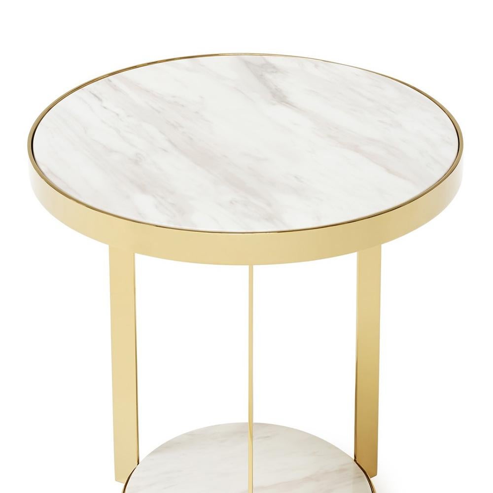 Side table Amy white with structure in metal
in gold finish and with up and down white
marble tops.
Also available in chrome finish with black marble tops.