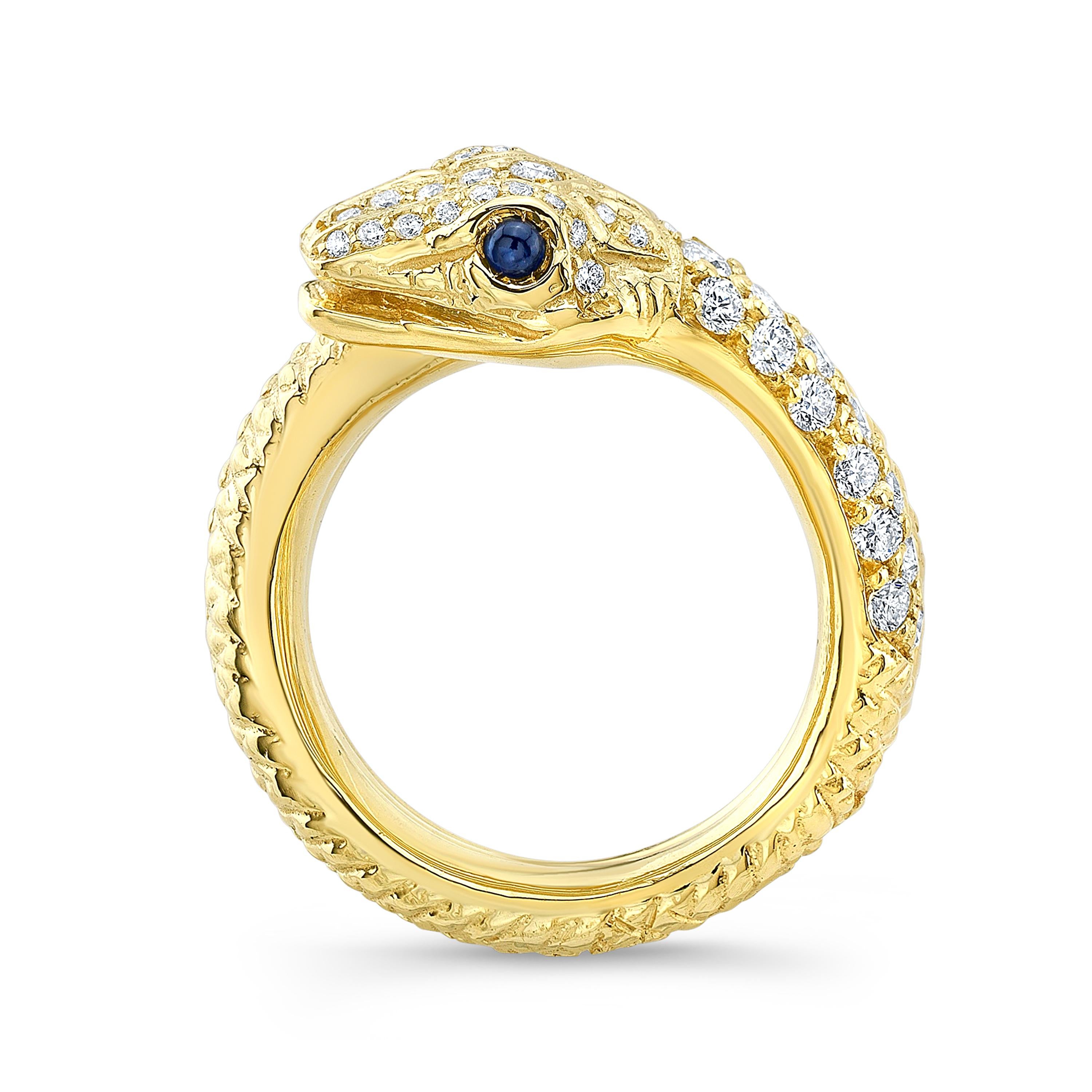 Amy's 18K-yellow gold, diamond and sapphire serpent ring 'Noah' is a fabulous replica of this lovely animal in nature. This contemporary serpent ring was handmade in 2019 by Amy's skilled artisans, in 18K-yellow gold with 1.12ct. full cut, Vs,