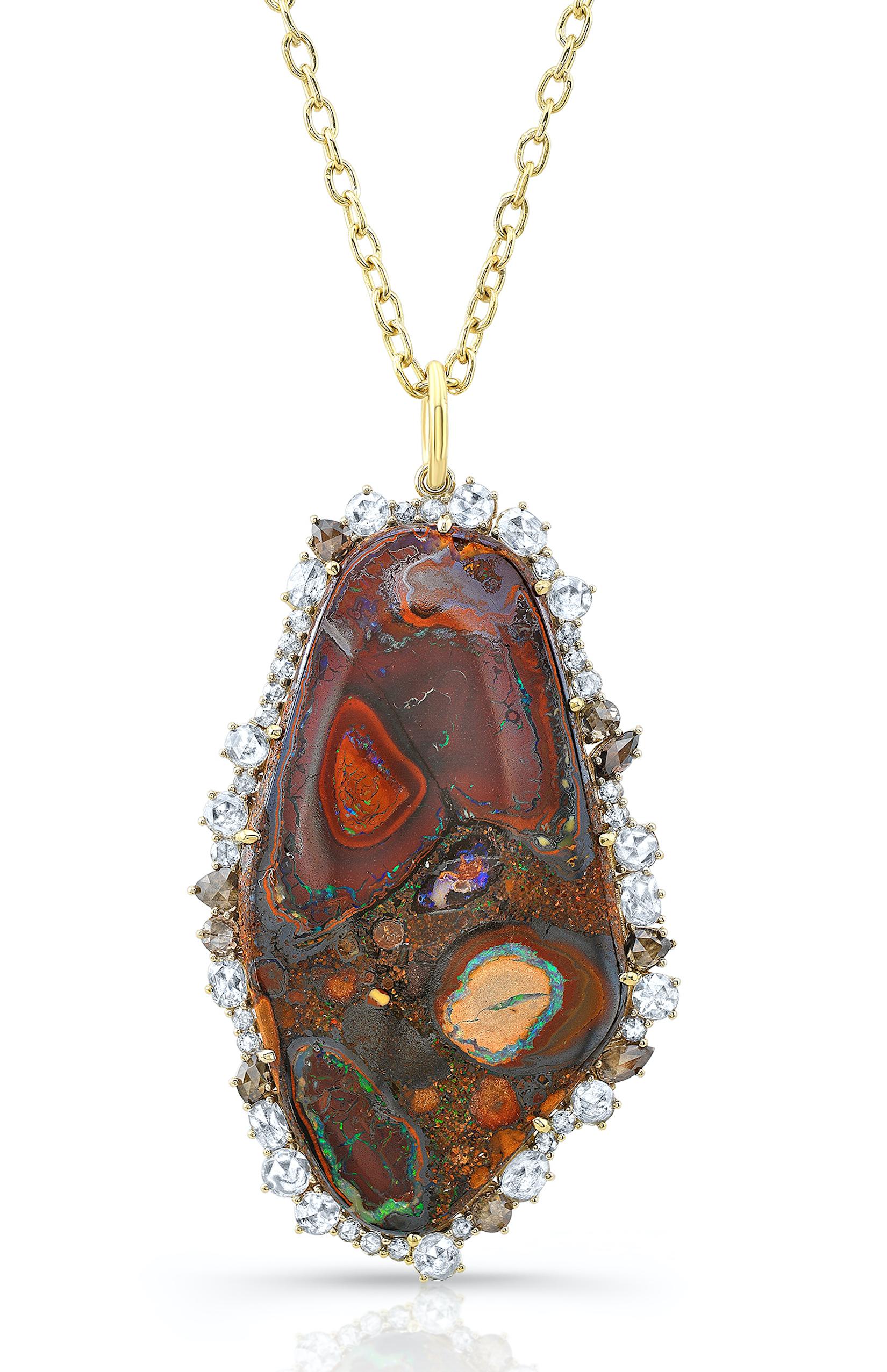 Amy Y's contemporary boulder opal and diamond pendant necklace is a one-of-a-kind piece for all occasions.  Amy's design delivers unparallel artistry by combining her uniquely multi-colored boulder opal with rose-cut diamonds.  Superbly set in
