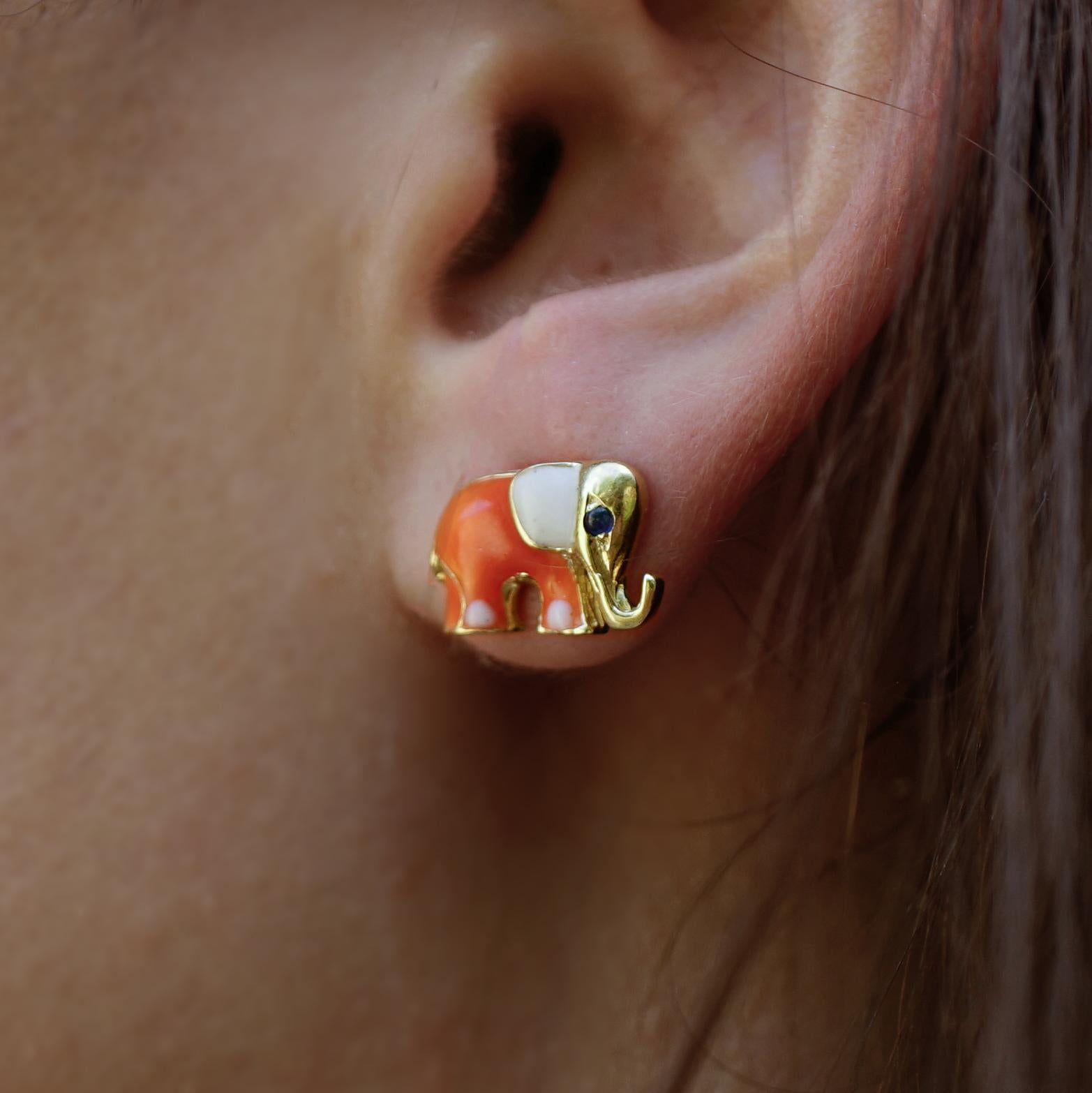 Amy Y's 18K-yellow gold, diamond, sapphire, and enamel Elephant earring 'Sateo and Raja' represent the genuine adoration of all elephant lovers. Charmingly paired in diamond inlay and offered in colors of the rainbow with painted enamel by special