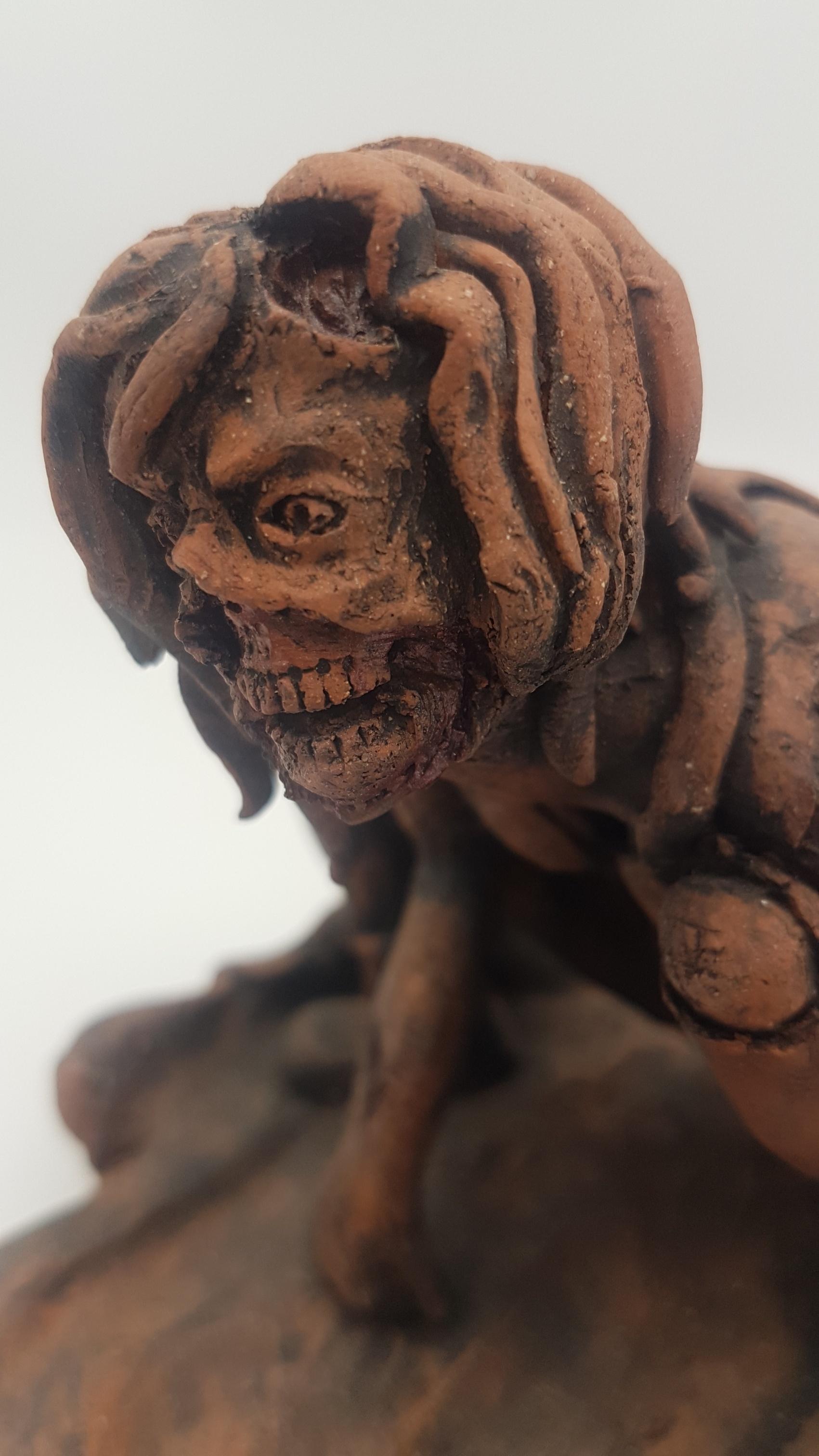 Title : Kneeling Female Zombie
Materials : Wood Fired Porcelain
Date : 2016
Dimensions : 5″ x 6.25″ x 5″
Signed
Gallery COA provided

------------------------

Amy Young Artist Statement:

