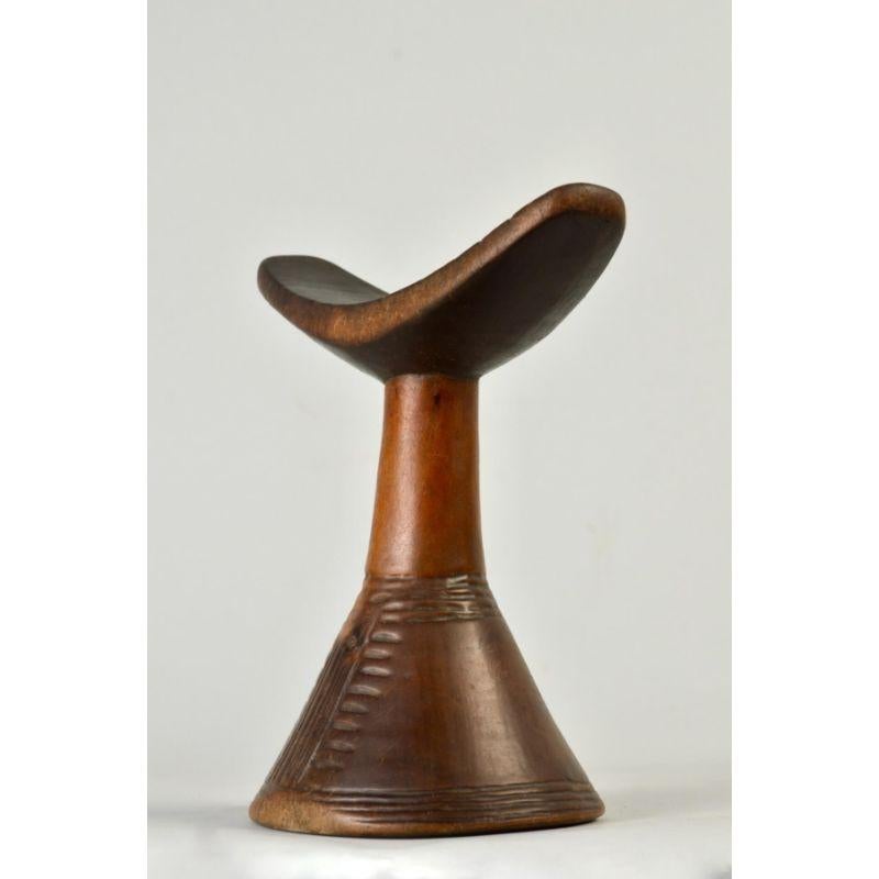 Jimma Carved Headrest with Engraved Designs

This type of headrest was made using a hand-driven lathe by a woodworker specializing in woodenware. This piece is from the Oromo region, southwest of Addis Ababa, upper Omo Valley. 

Additional