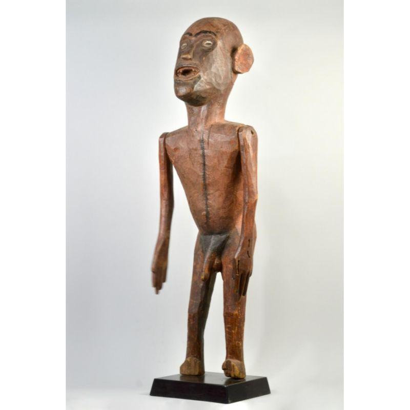 Carved, vintage Male Sukuma Figure with Articulated Arms

Such figures are carried in ritual performances. This is a fine example with original arms and signs of wear. IIt has a much handle, deep and varied patina. The work is guaranteed to be as