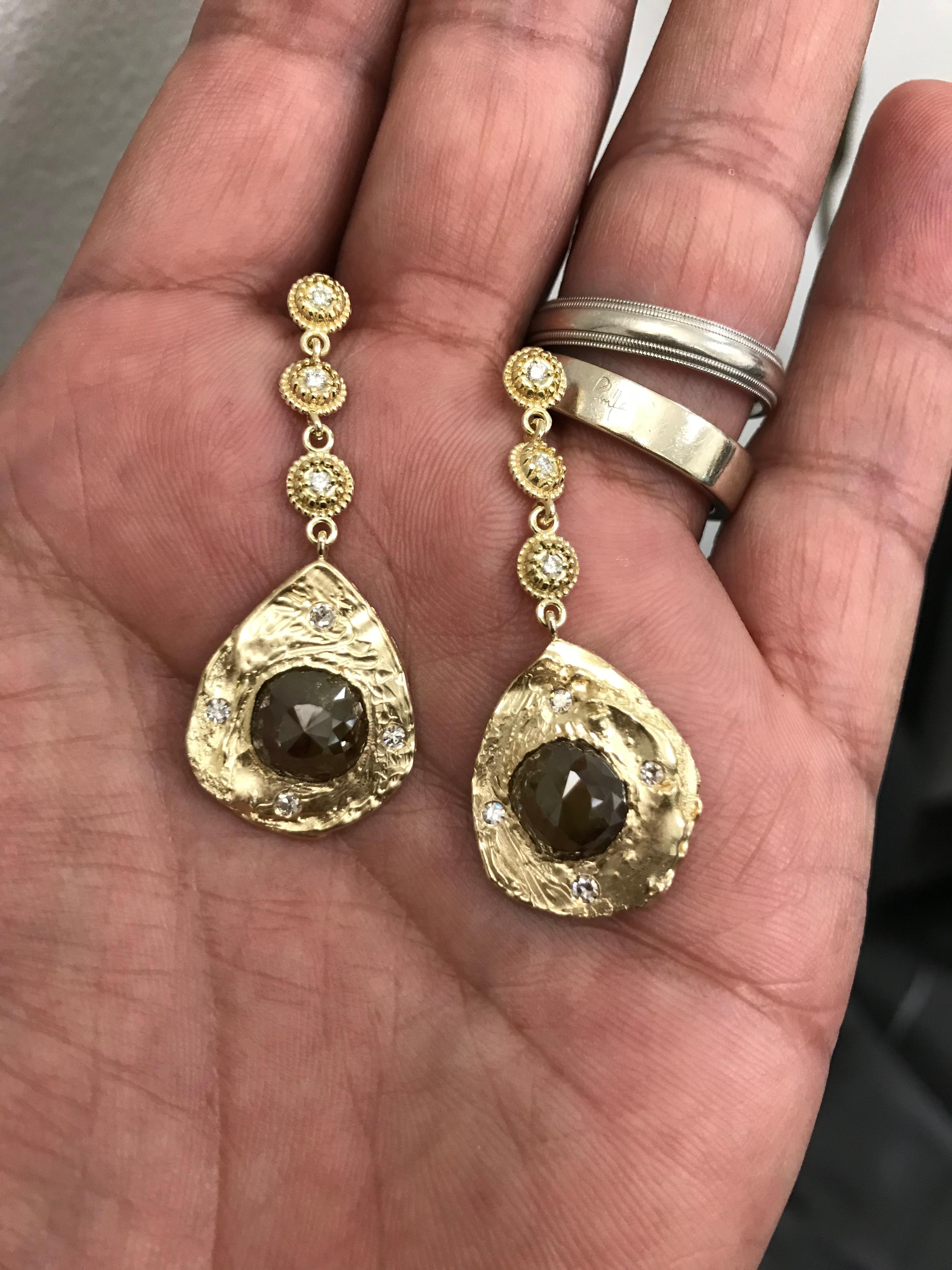 Natural Color Cushion Rosecut Diamond Earrings set in 18k Yellow gold designed by Amyn The Jeweler

Pair of Cushion Diamonds 4.72 cts. 

14 diamonds 0.44cts. 

Total Diamond weight 5.16cts

Passionately Created and Made in Los Angeles.

Model: