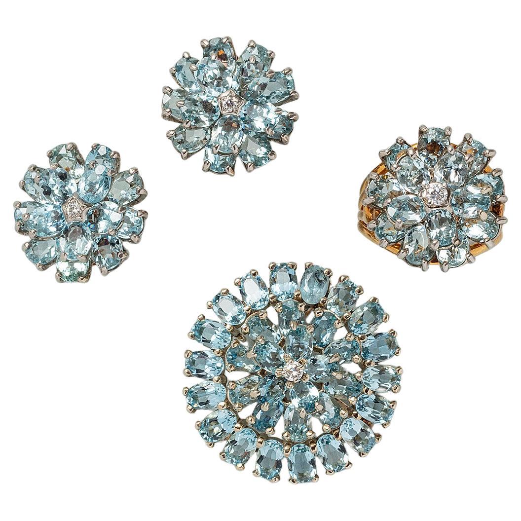 An 14k Gold Flower Set with Aquamarine