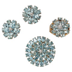 An 14k Gold Flower Set with Aquamarine