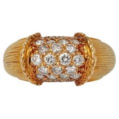 An 18 Carat French Band Ring with Diamonds