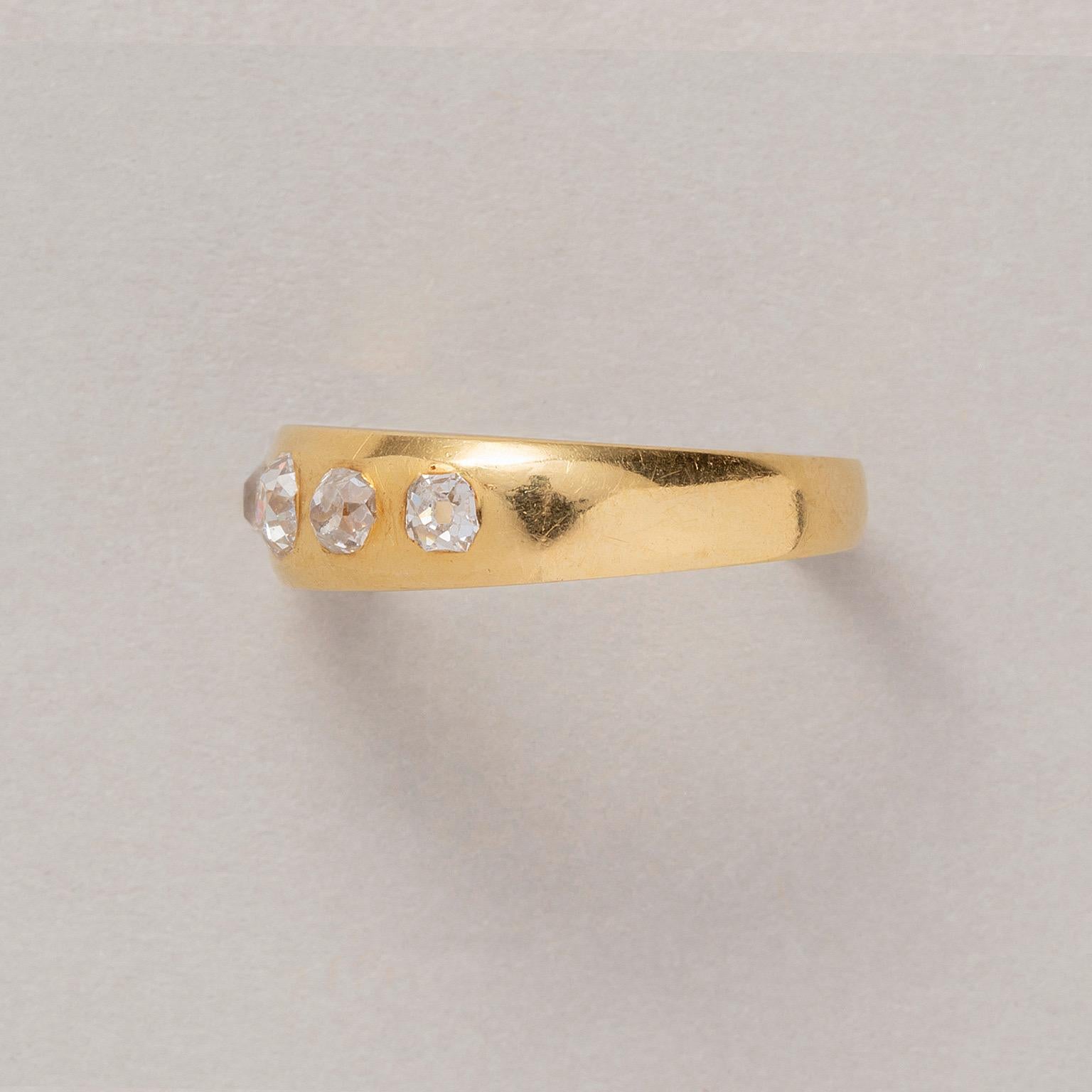 An 18 carat gold band ring set with 5 old cut diamonds (app. 0.71 carat in total), London, England, 1923, master mark JW.

weigth: 4.9 grams
ring size: 18 mm / 7 3/4 US
width: 3 – 6 mm.