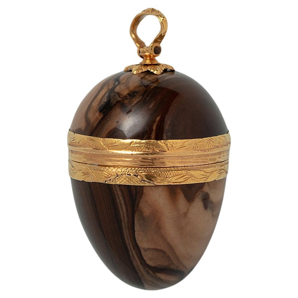 An 18 Carat Gold and Jasper Egg Pendant For Sale