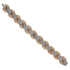 An 18 Carat Gold and Platinum Sterlé Bracelet