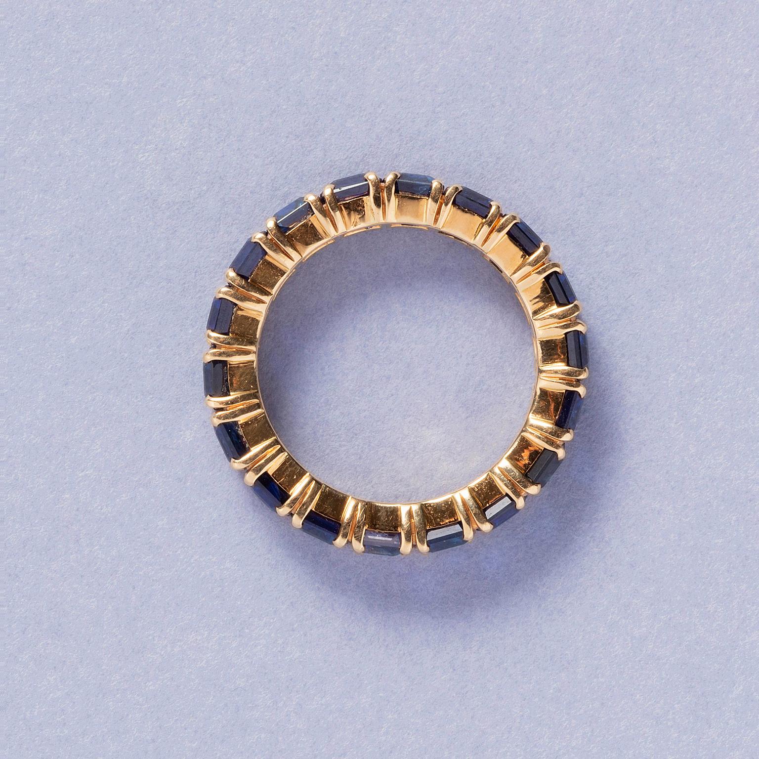 Baguette Cut 18 Carat Gold and Sapphire Boucheron Eternity Ring For Sale