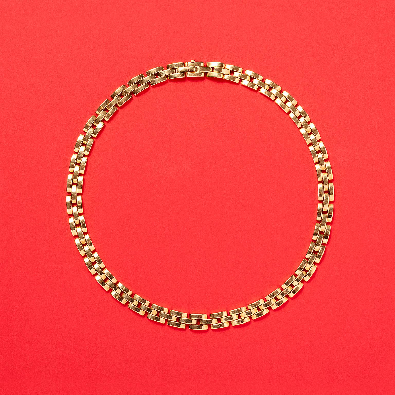 An 18 carat yellow gold necklace, signed and numbered: Cartier, 660773, model: maillon Panthère.

weight: 77.3 g
length: 42 cm
width: 8 mm