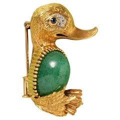 An 18 Carat Gold Cartier Paris Duck Brooch with Diamond, Sapphire and Aventurine