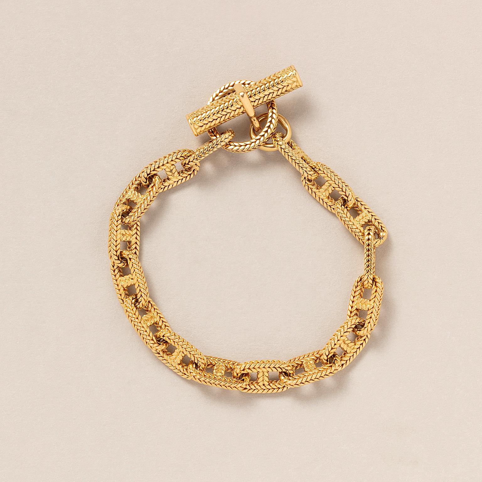 An 18 Carat Gold Chaine D'Ancre Tressee Hermès Bracelet In Good Condition For Sale In Amsterdam, NL